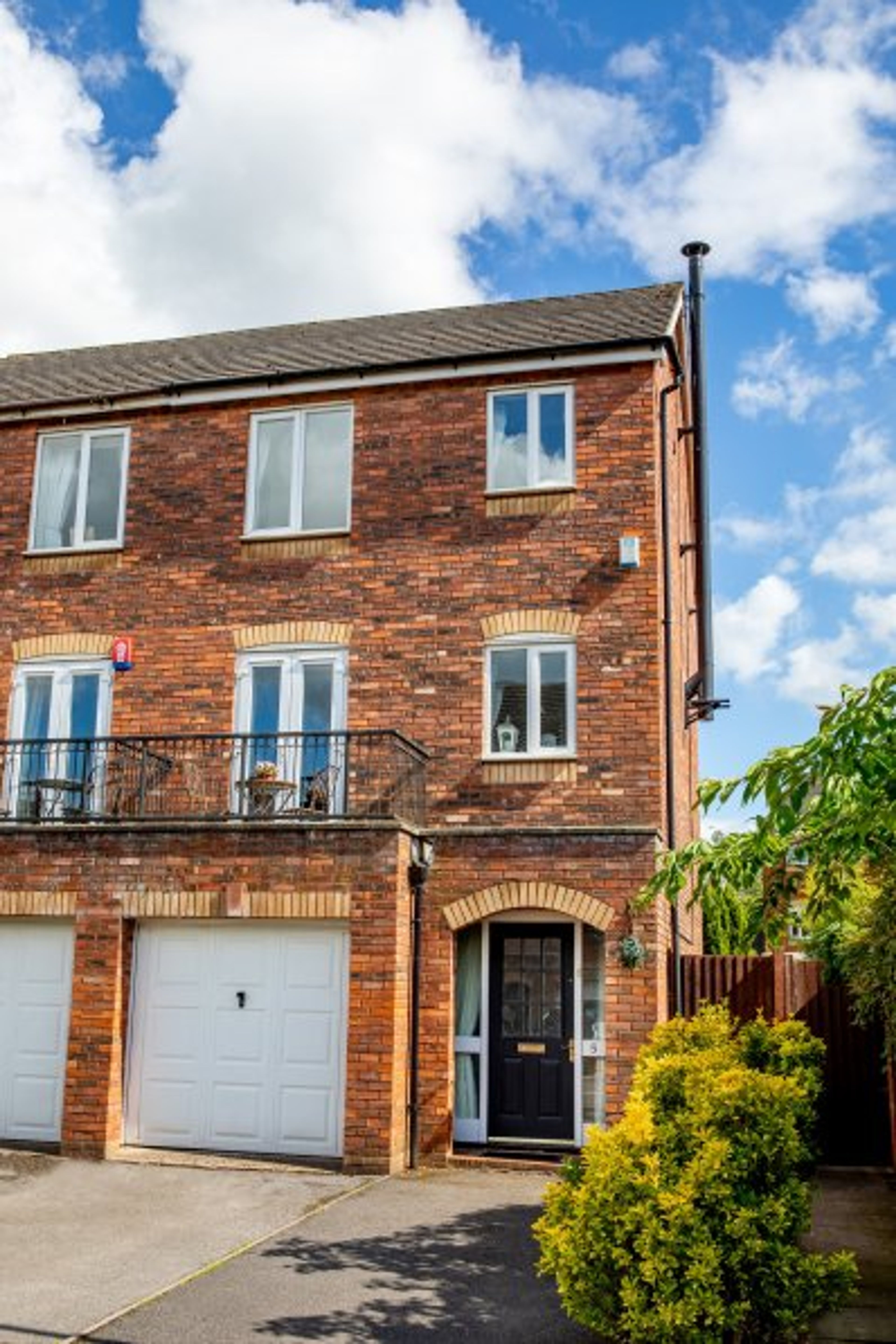 Front of the house with parking for 2 cars