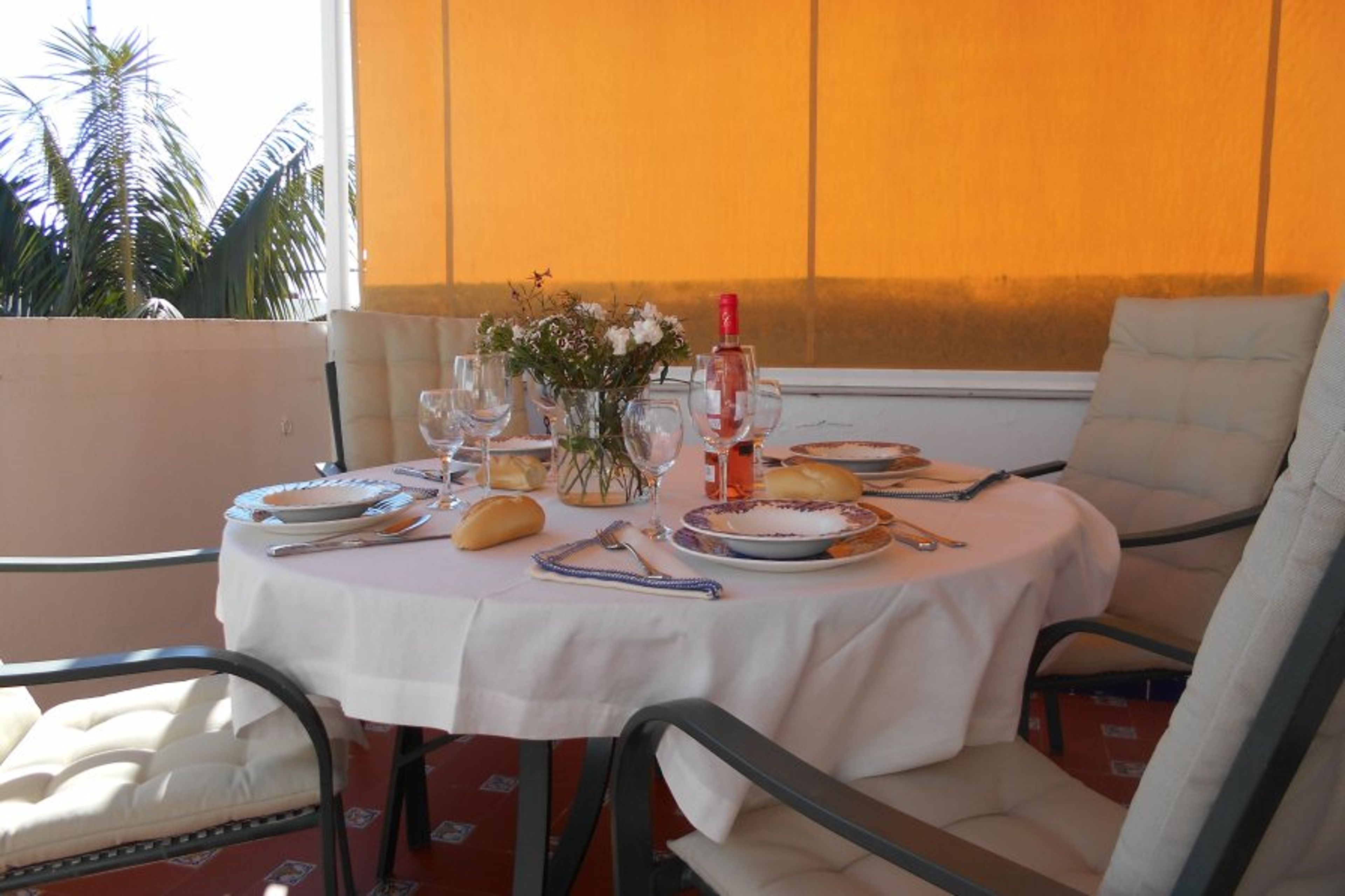 Terrace, very sunny (south facing) with awning and garden furniture.