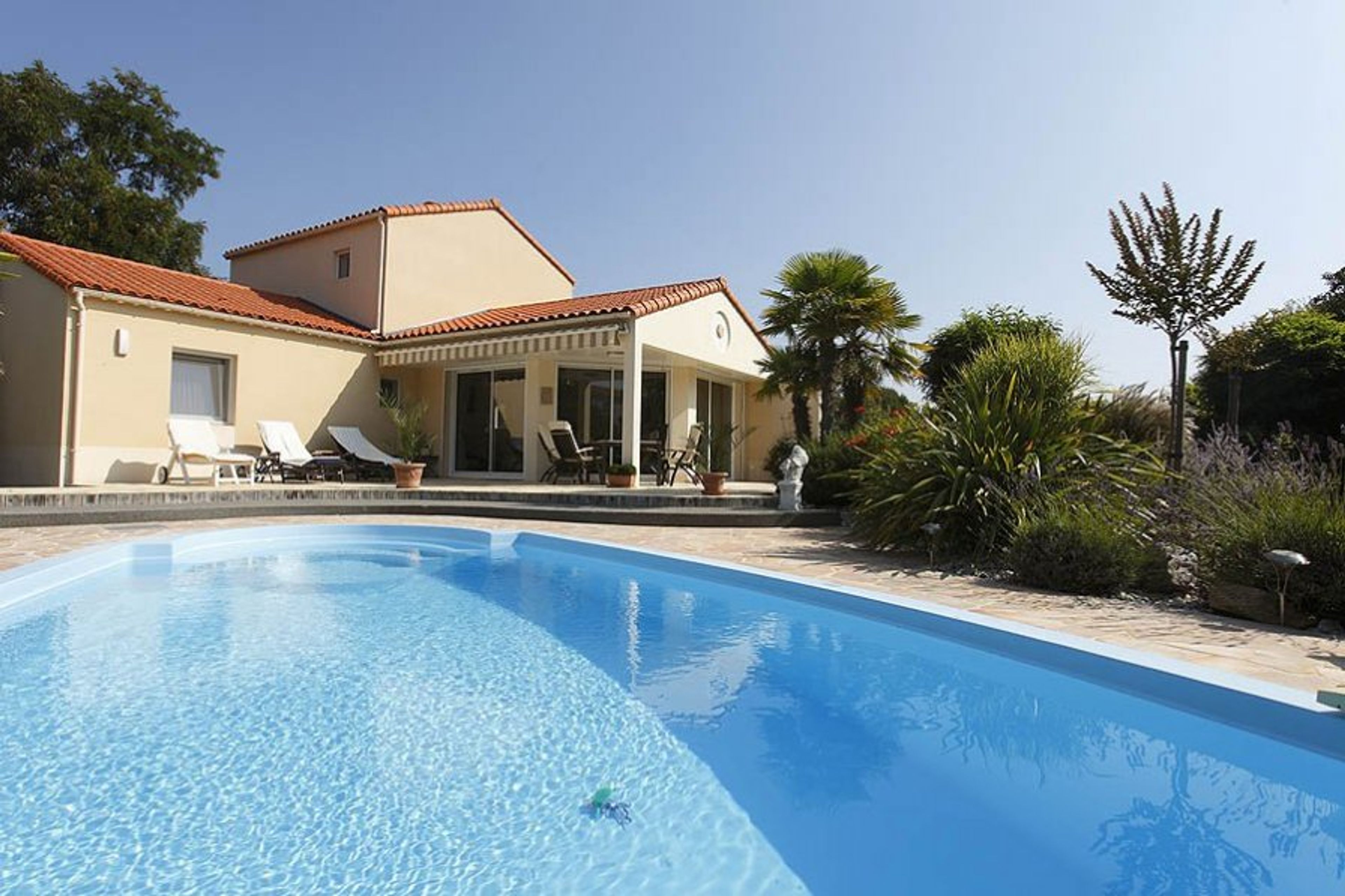 Photo of a villa shown as example. Actual villa may vary.