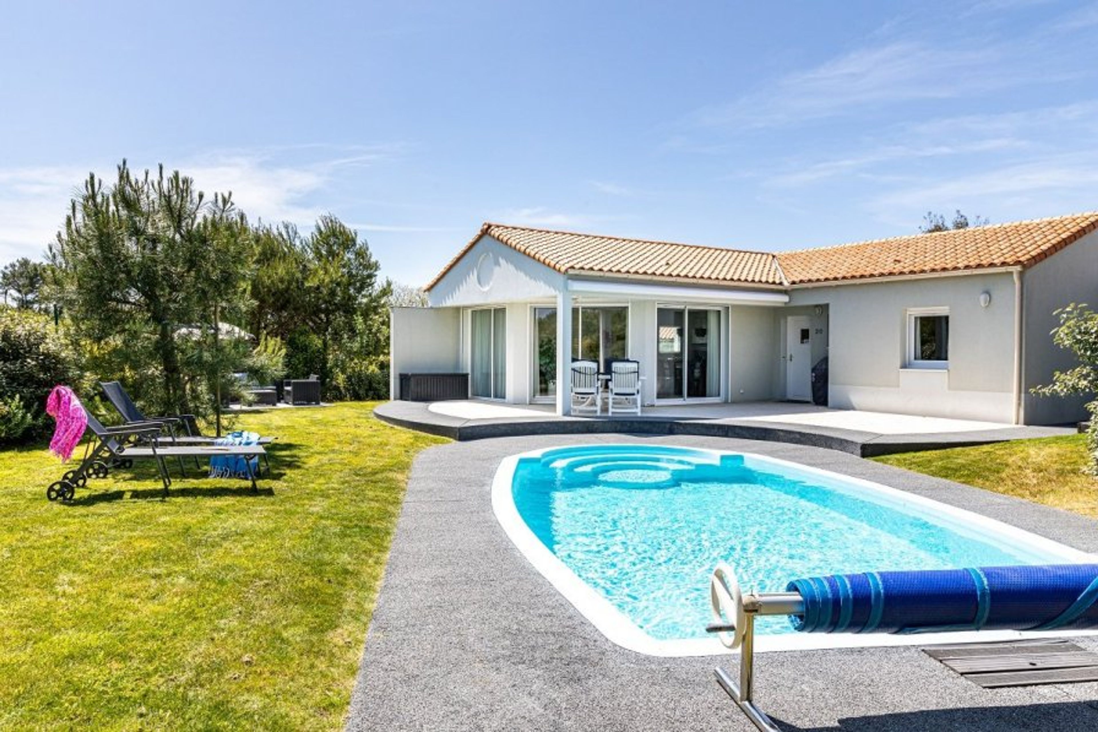 Photo of a villa shown as example. Actual villa may vary.