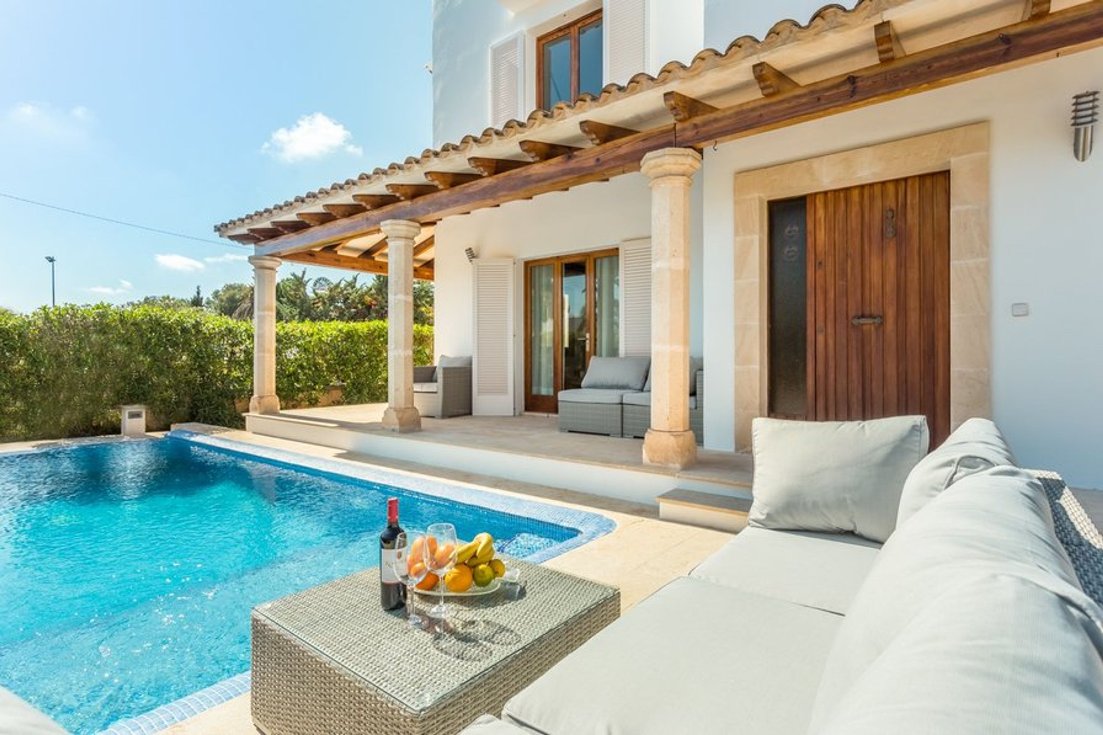 Relax view of entrance and terrace furniture.