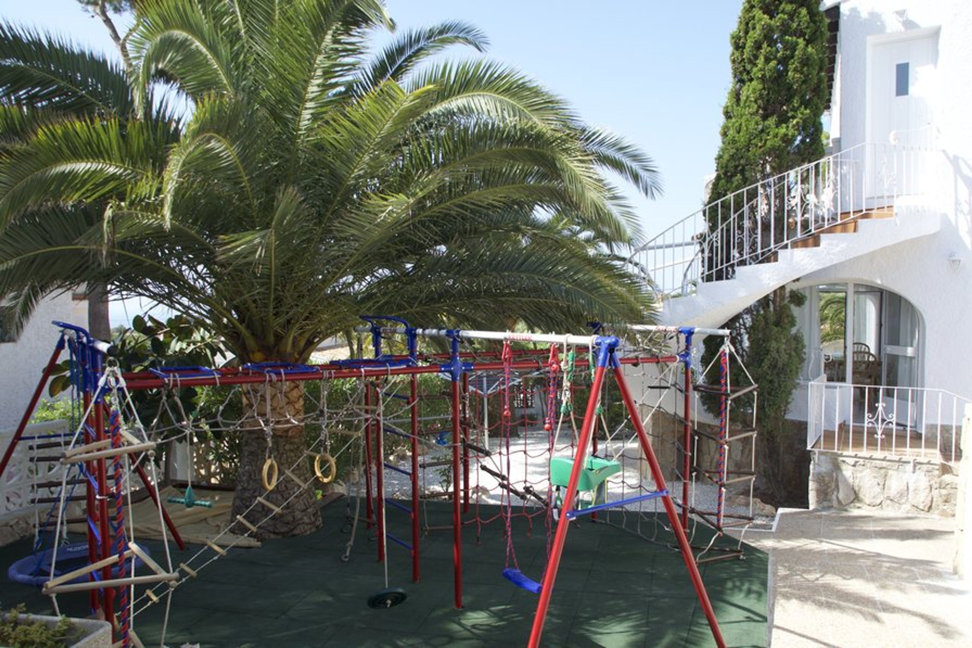 Private playground with a sand place
