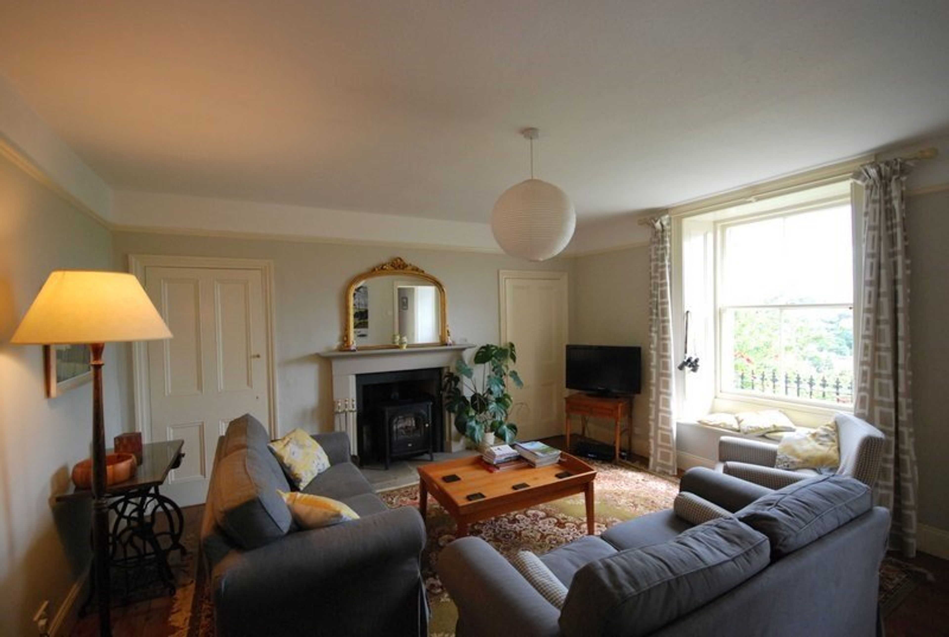 sitting room with multi fuel stove
