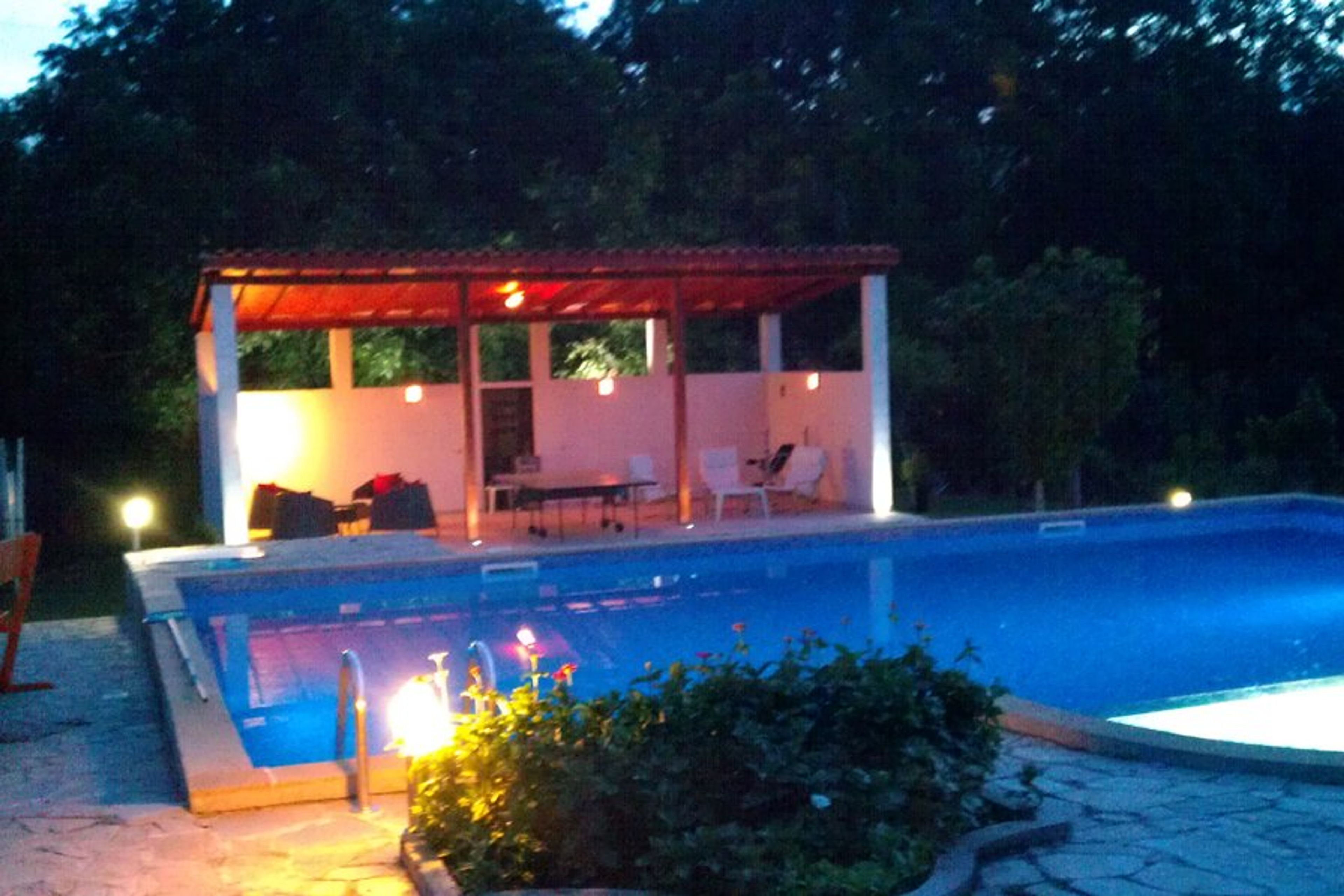 The Pool and Summerhouse in the evening
