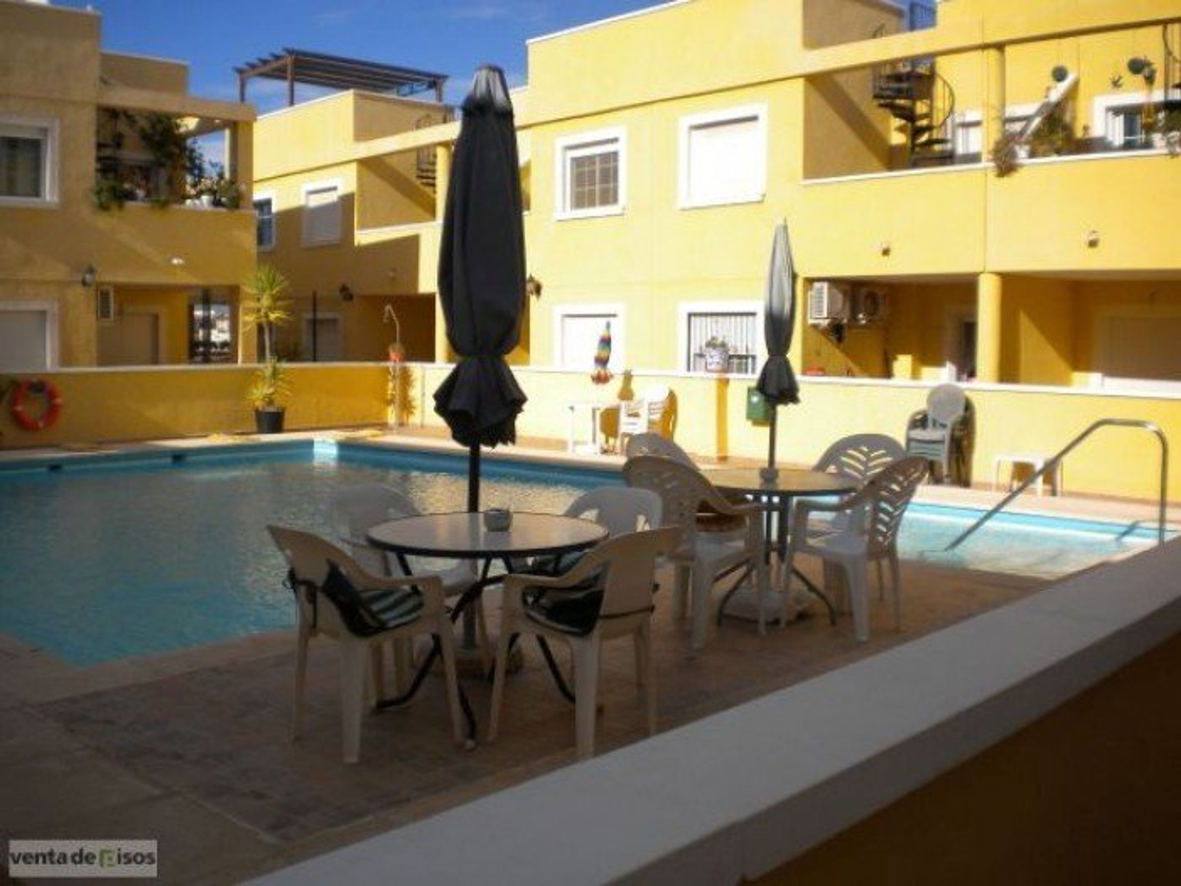 Small complex with communal pool