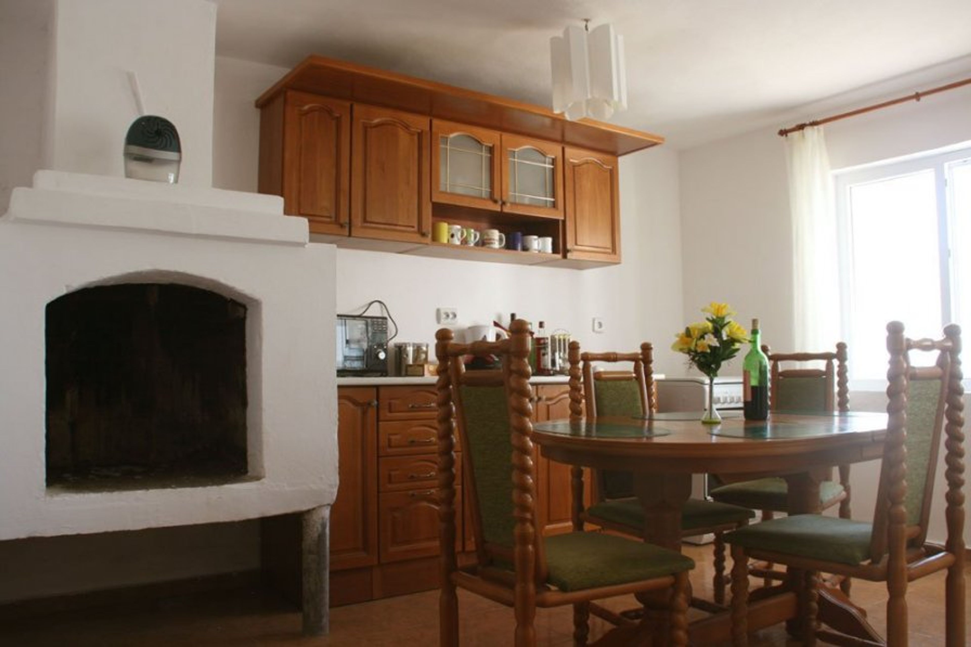 Kitchen with dining table (which is small if big family would come)