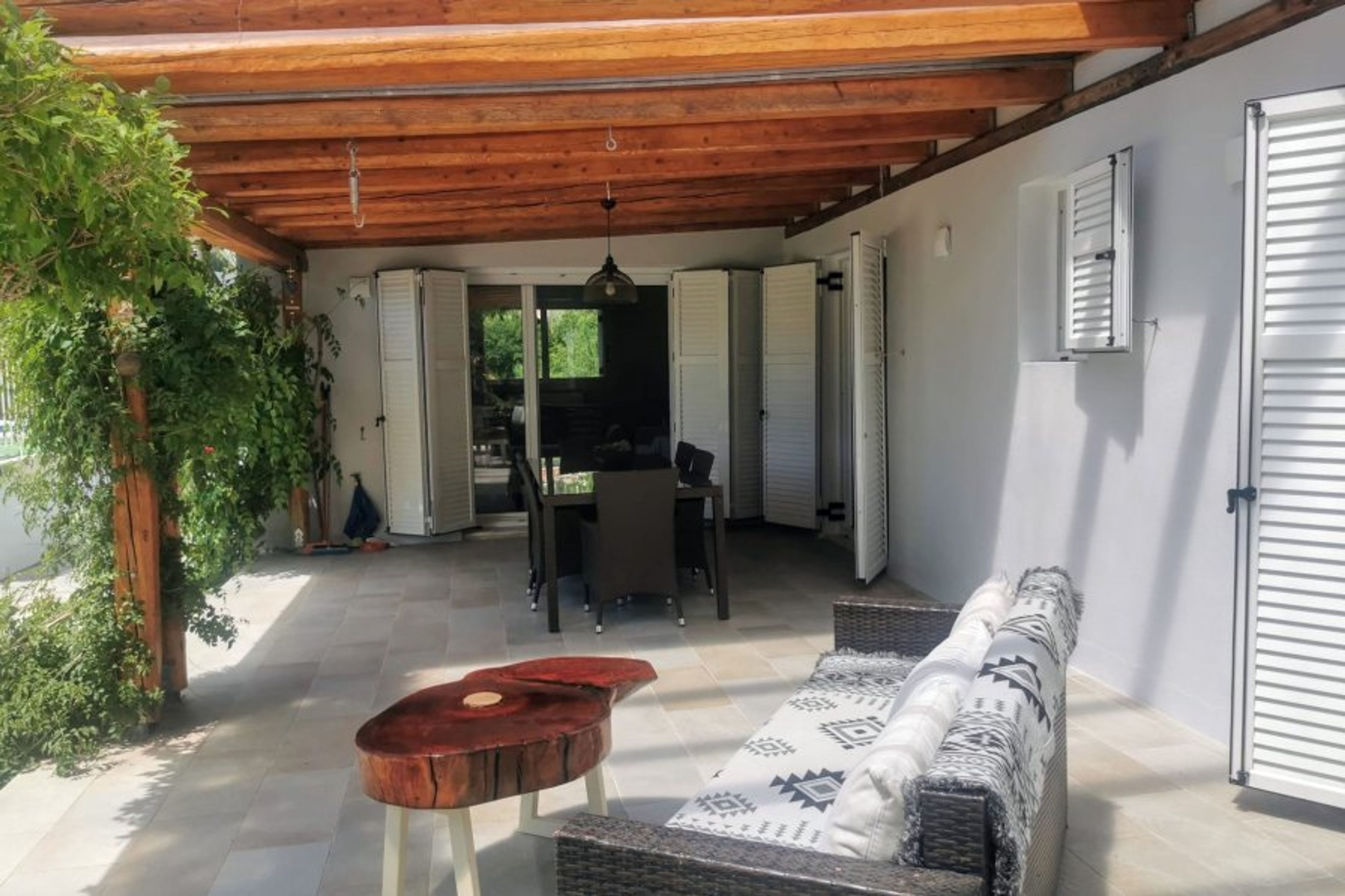 The covered patio area for dining and relaxing