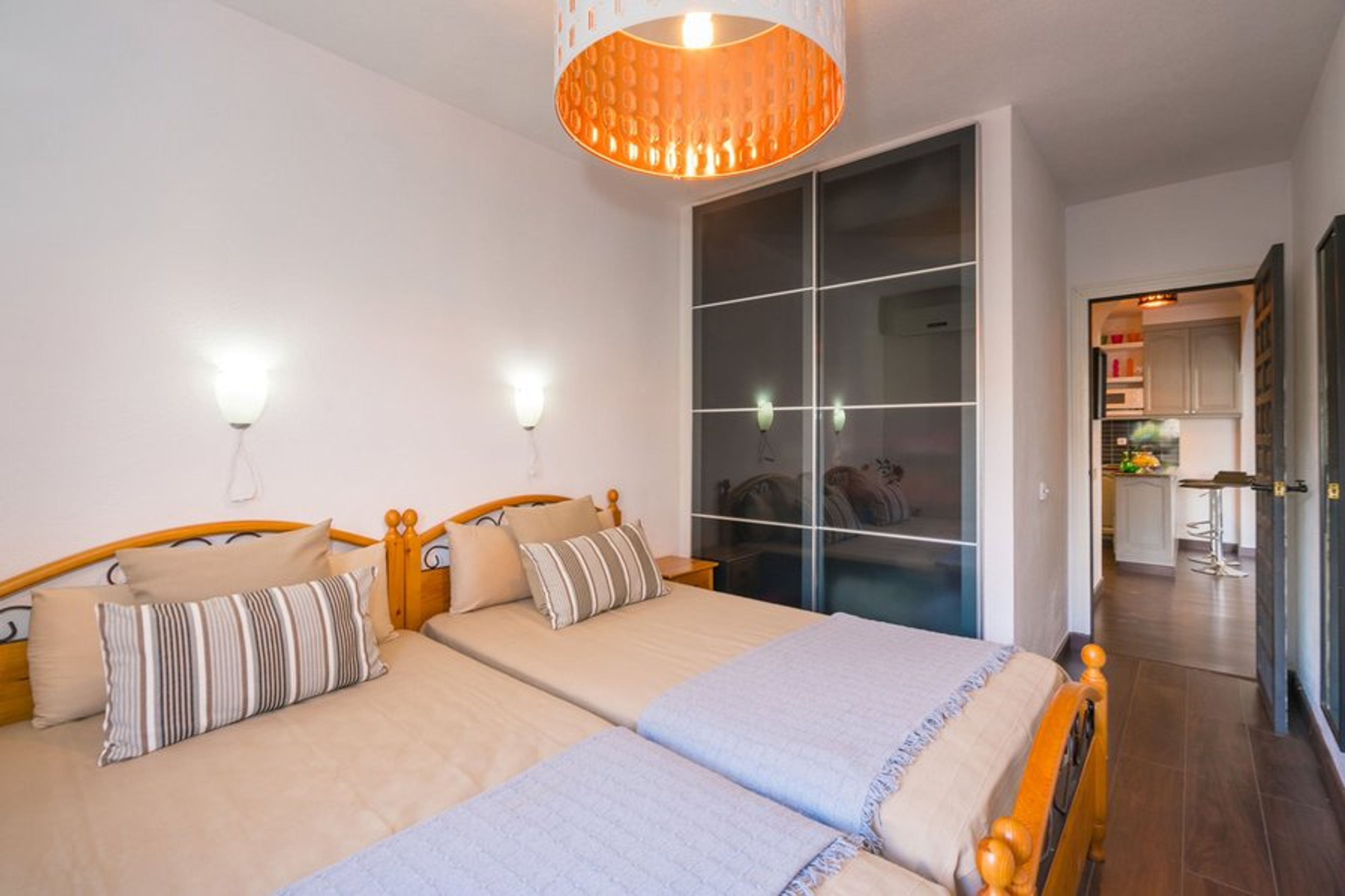 Bedroom One on the ground floor through to the Kitchen