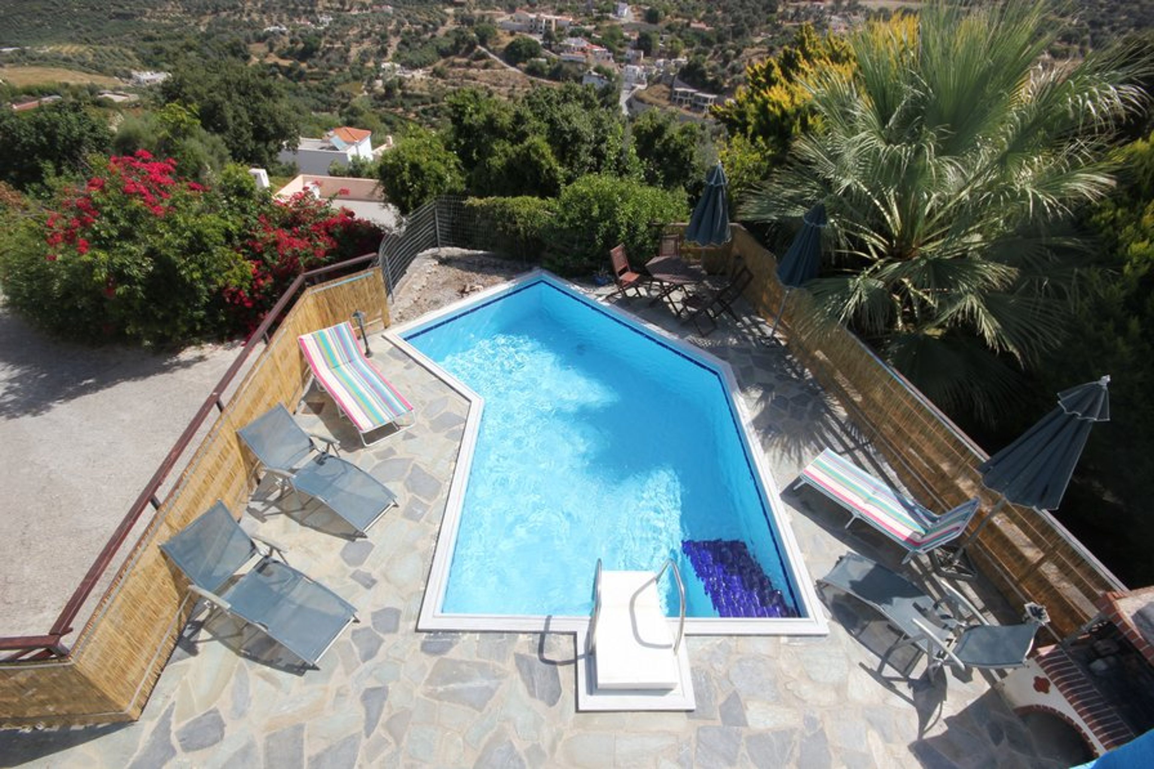 Villla Alexandra's pool overlooking the sea and the mountains.