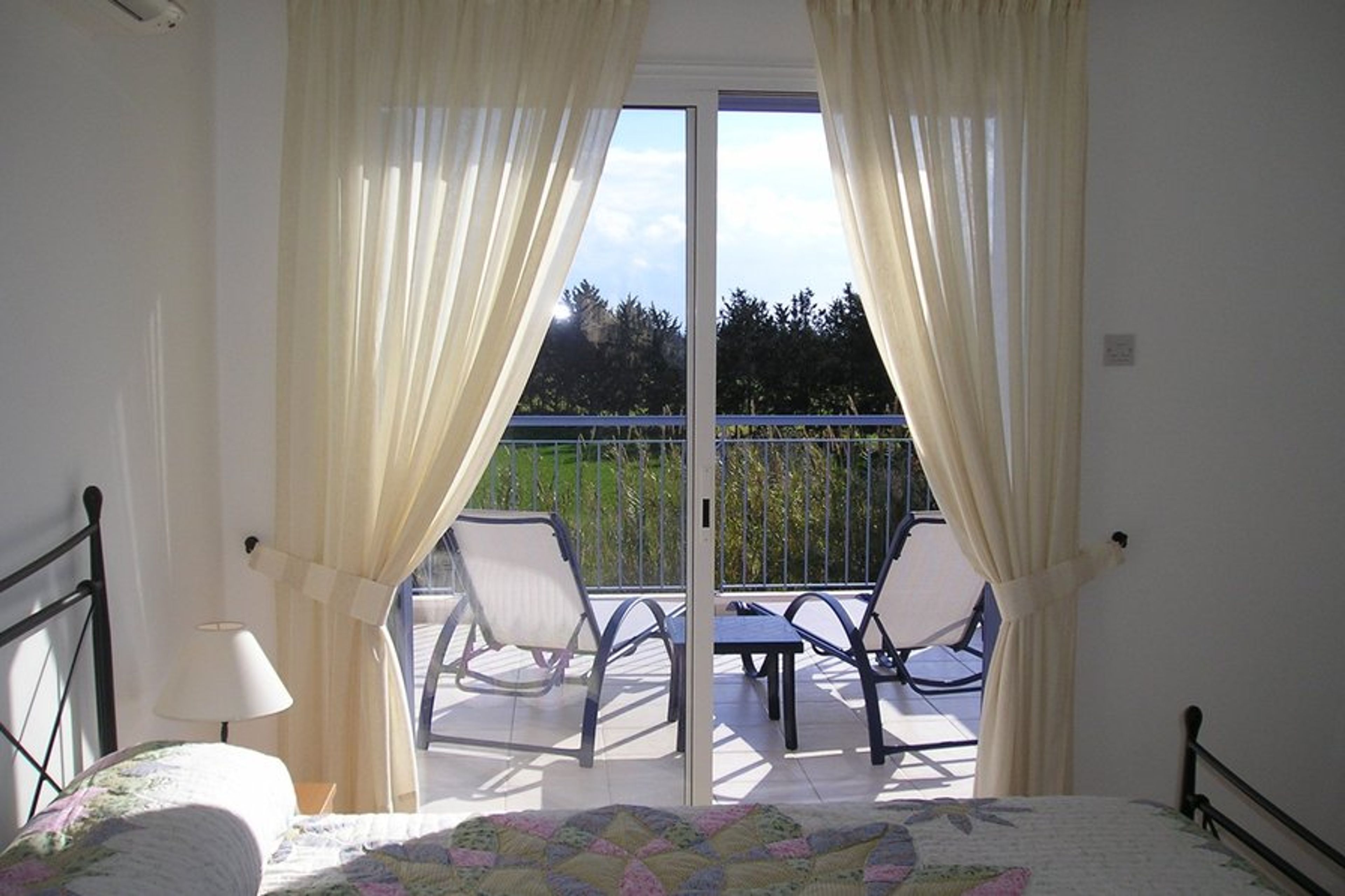 Master bedroom with en-suite and roof terrace overlooking the pool