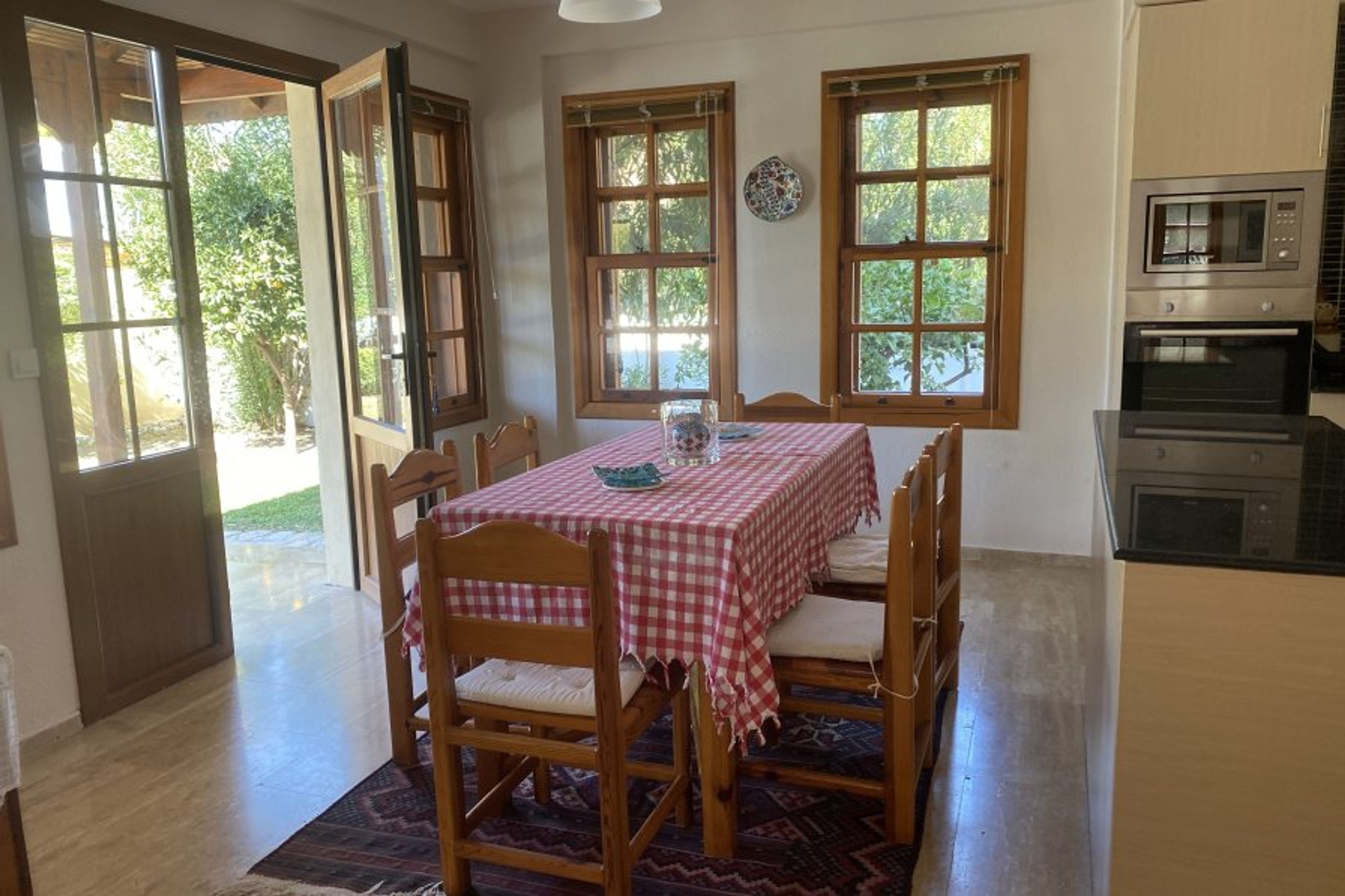 Dining area with doors onto the terrace