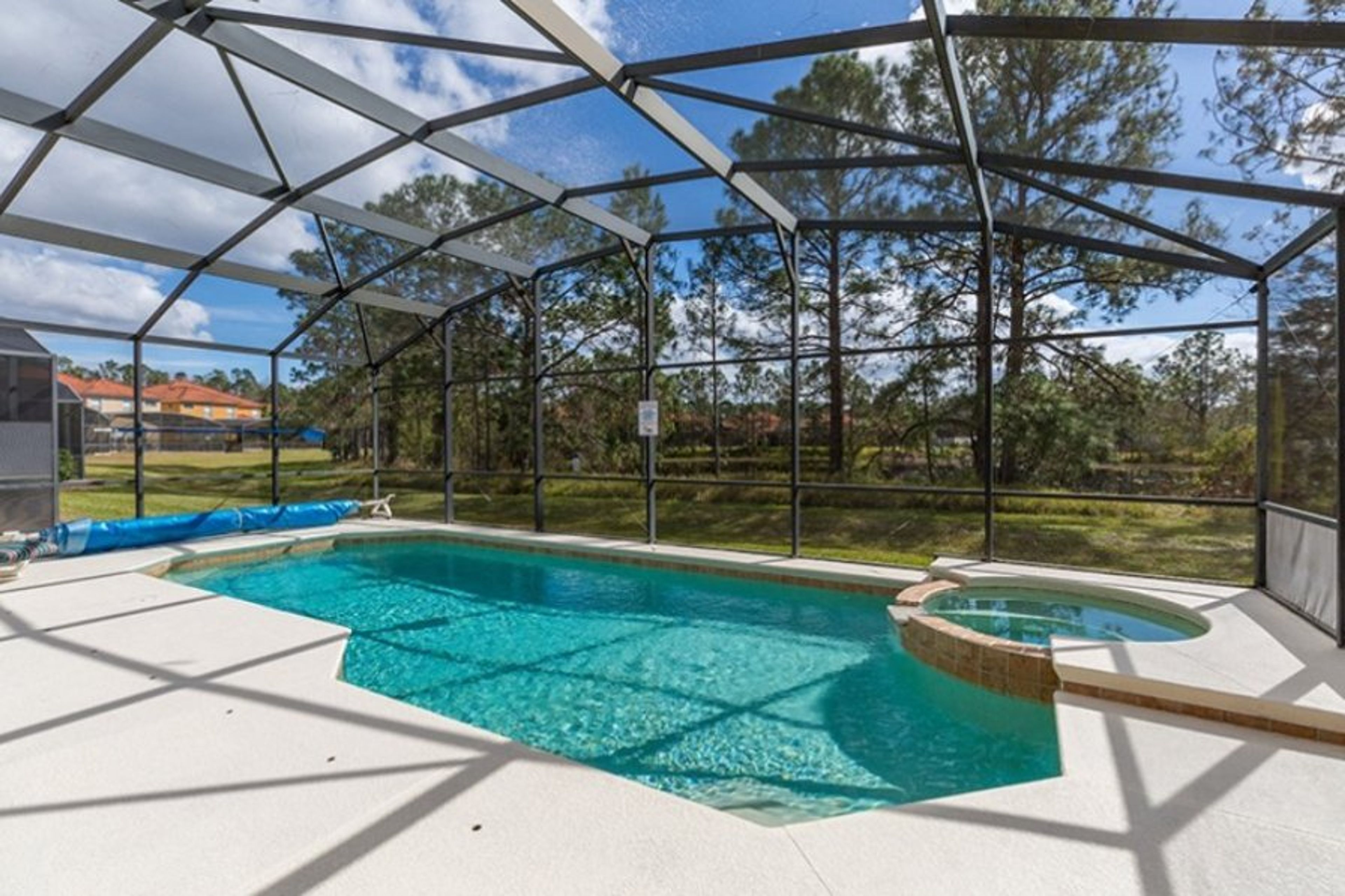 South facing pool / spa with lake view and lanai for shade