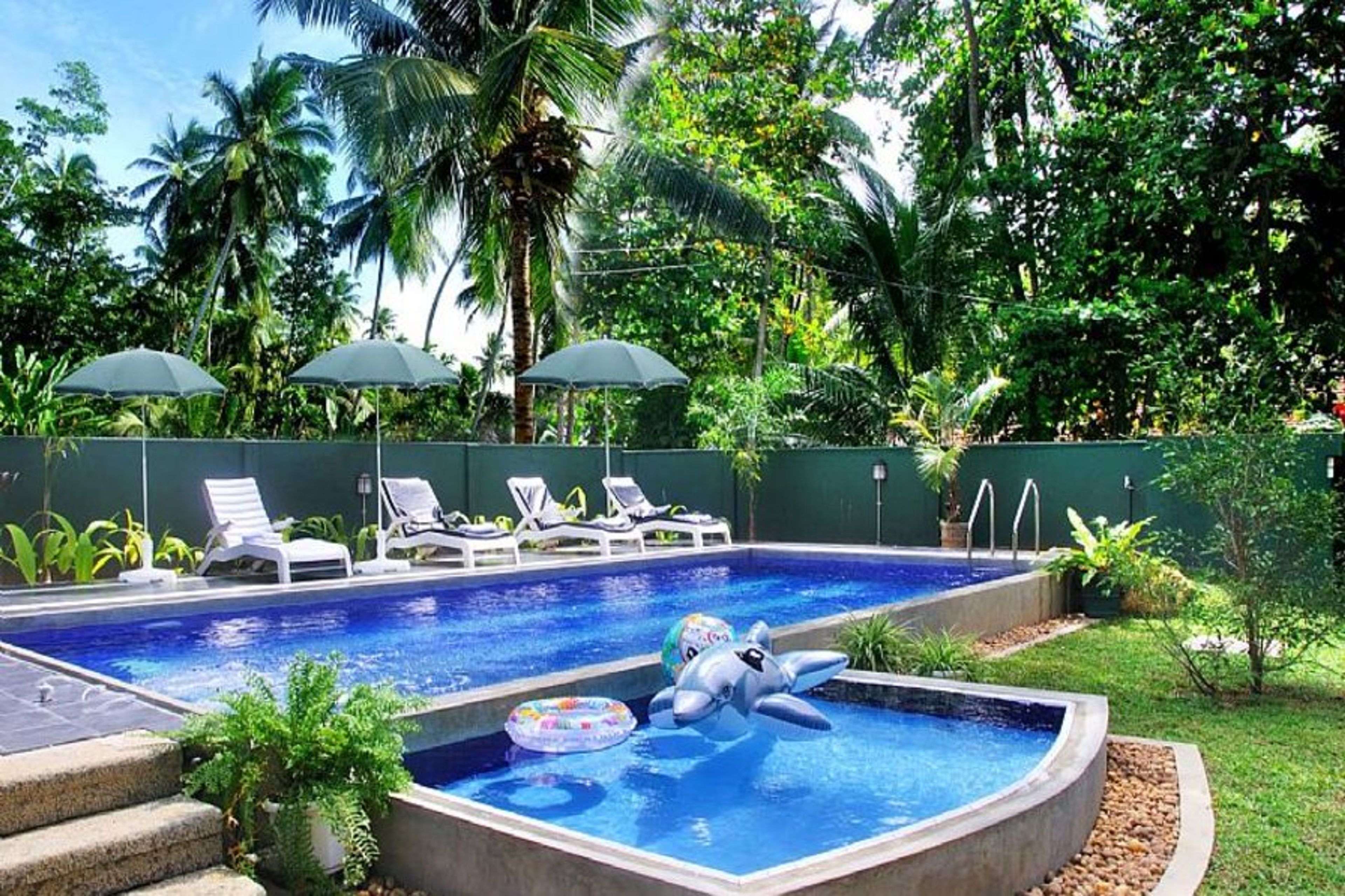 This is your private swimming pool with sunbeds
