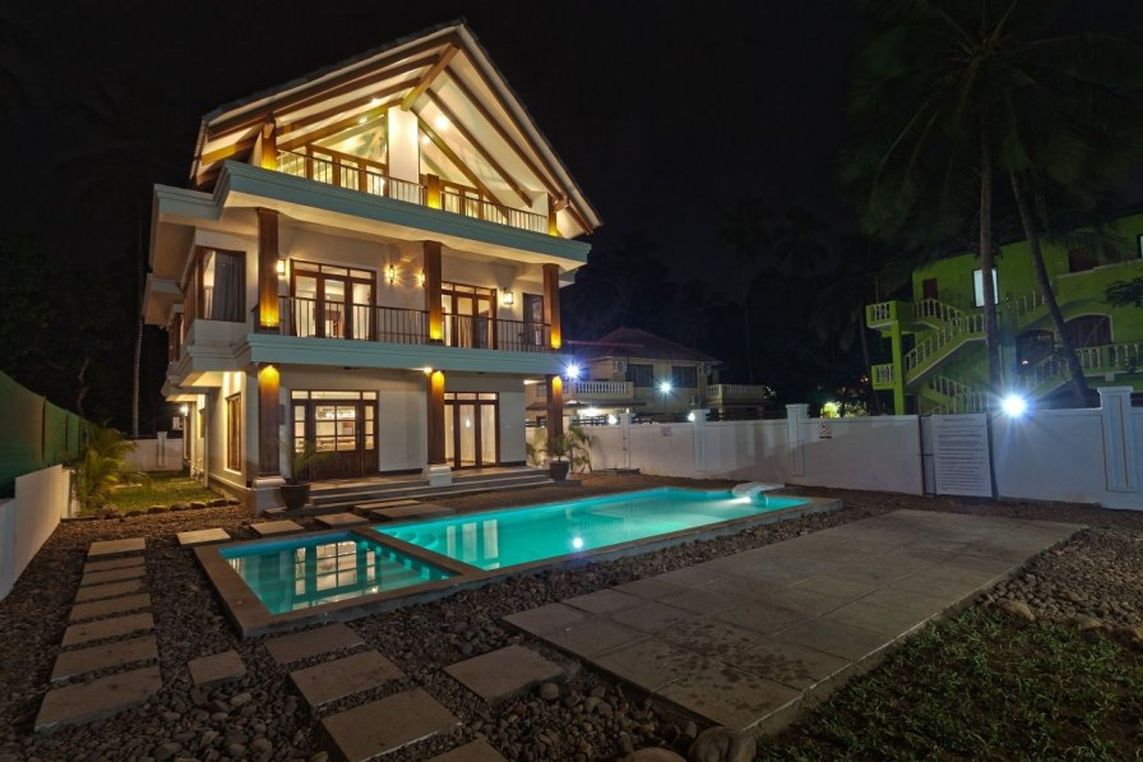 Balinese style villa with swimming pool night view