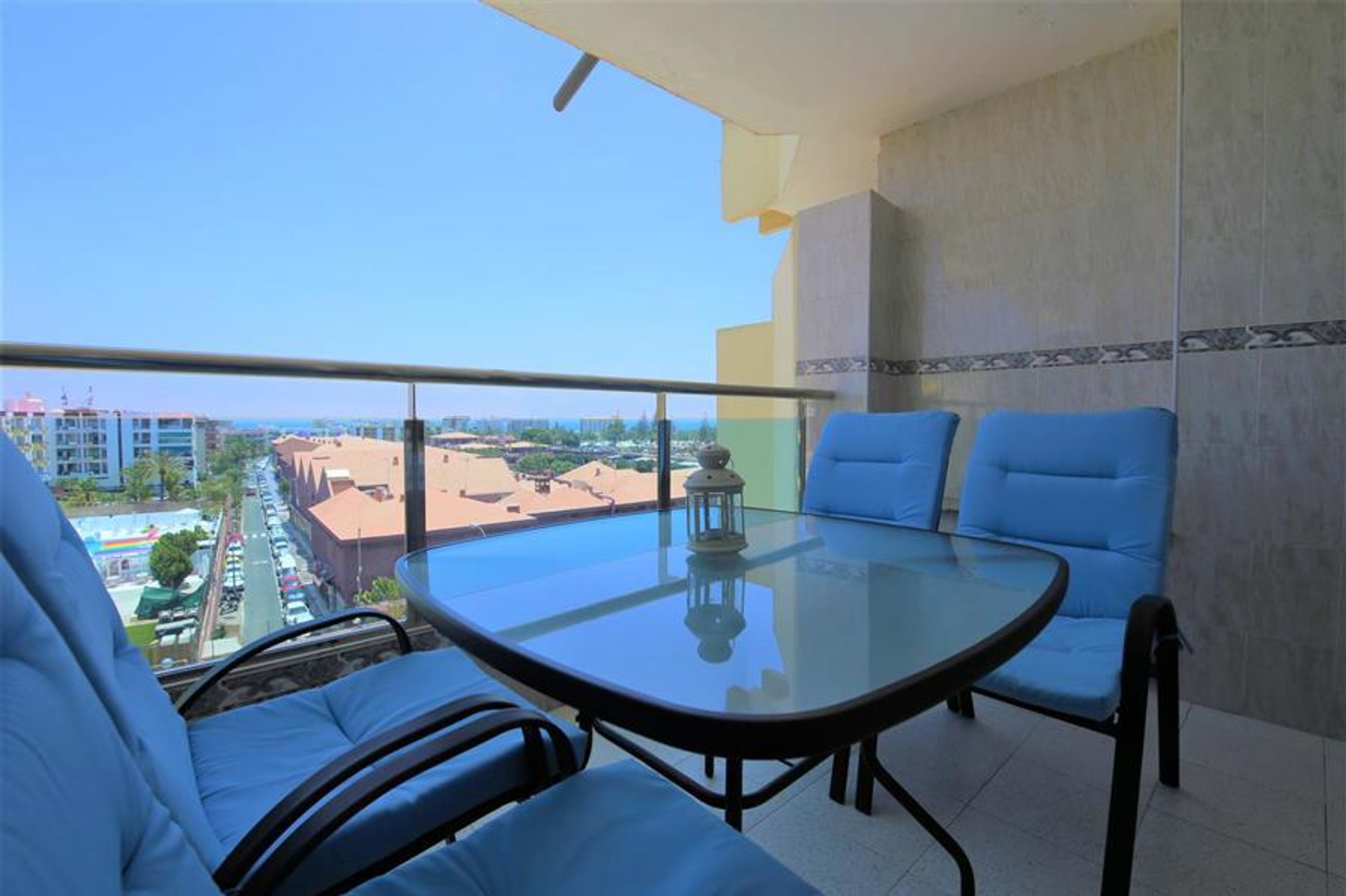Large balcony with comfortable seating overlooks t