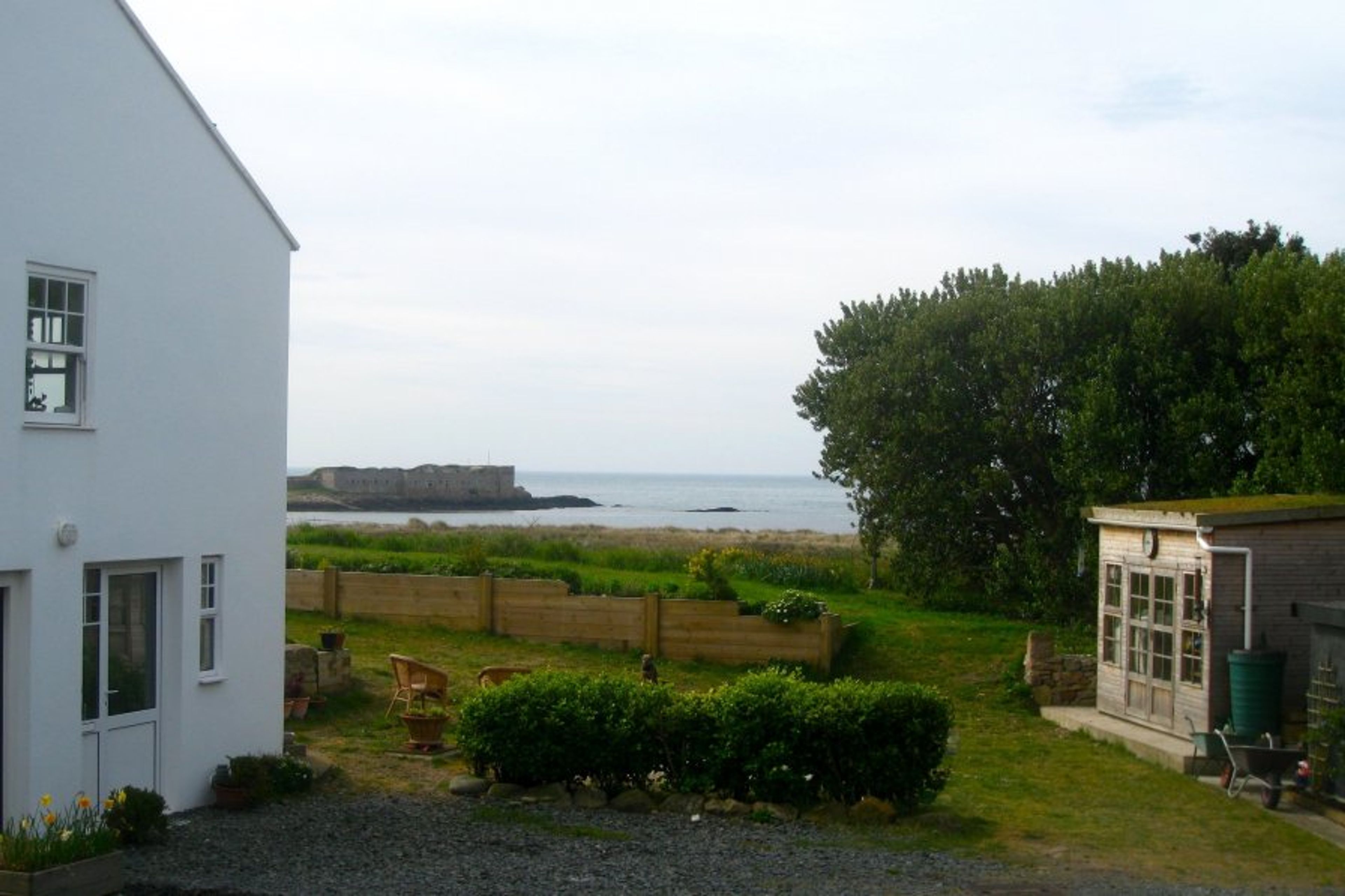Cottage entrance with Fort Raz in background