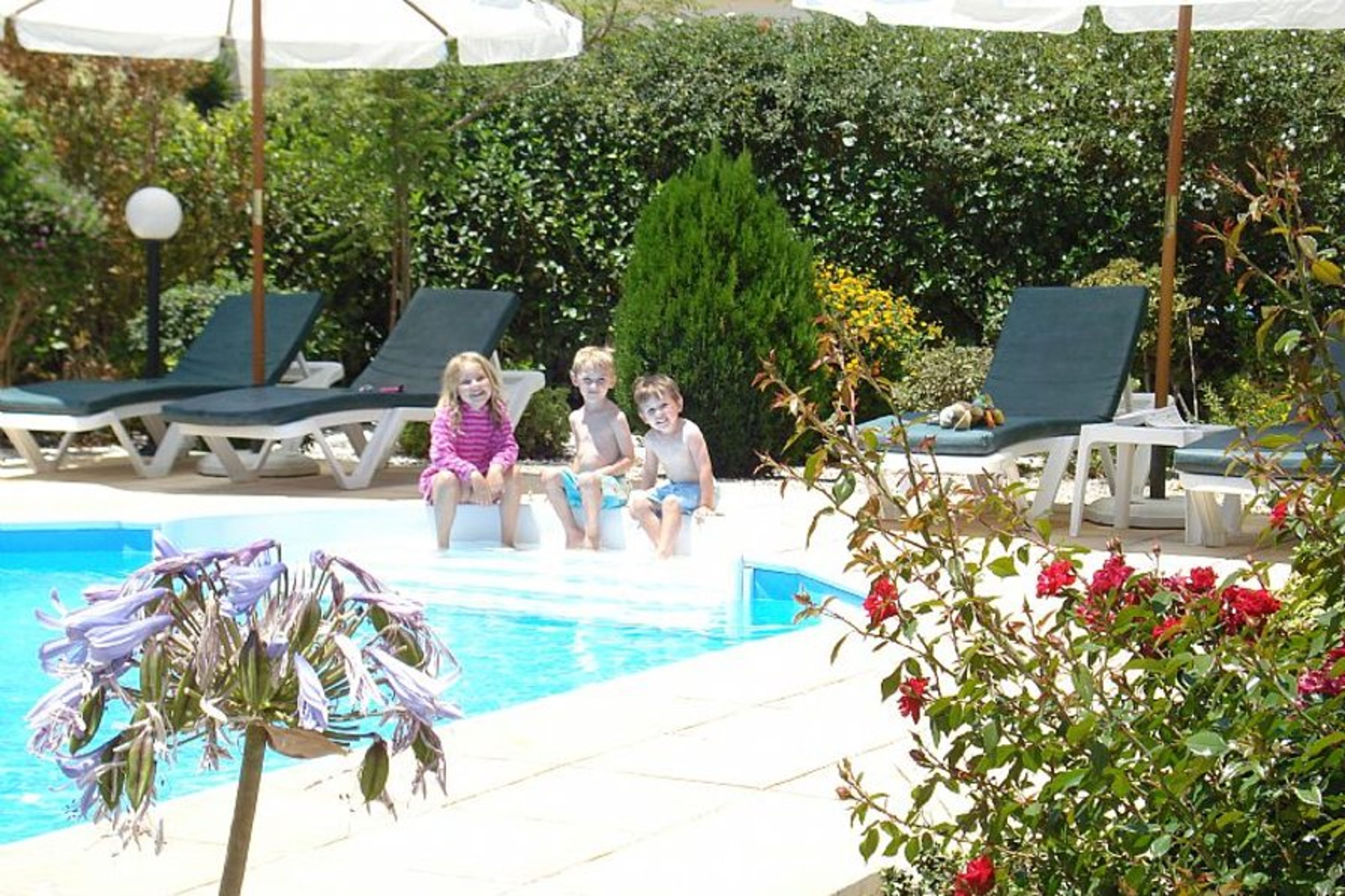 Landscaped gardens around the pool