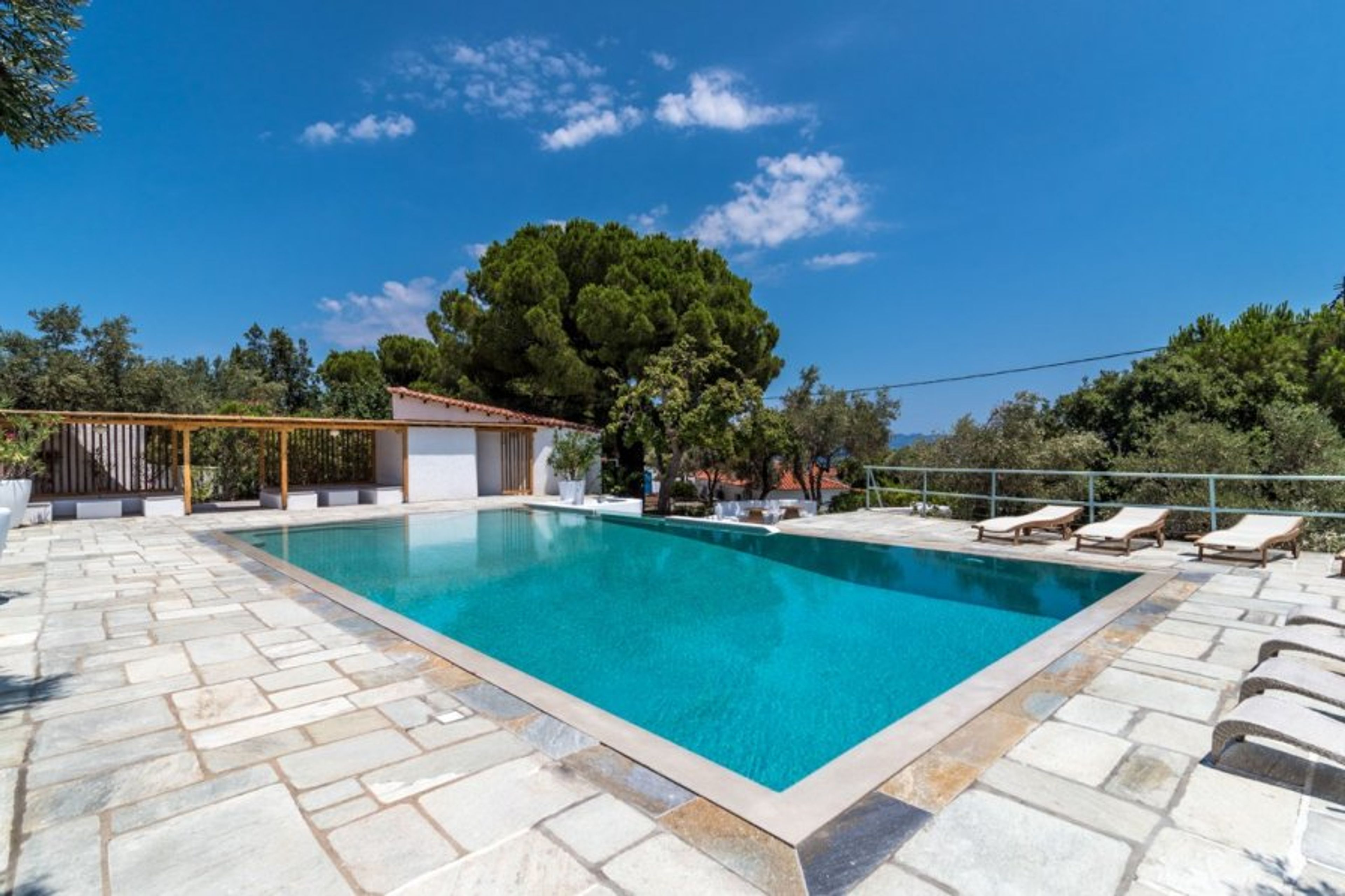 main pool with pool bar, lounge area and pool bathroom