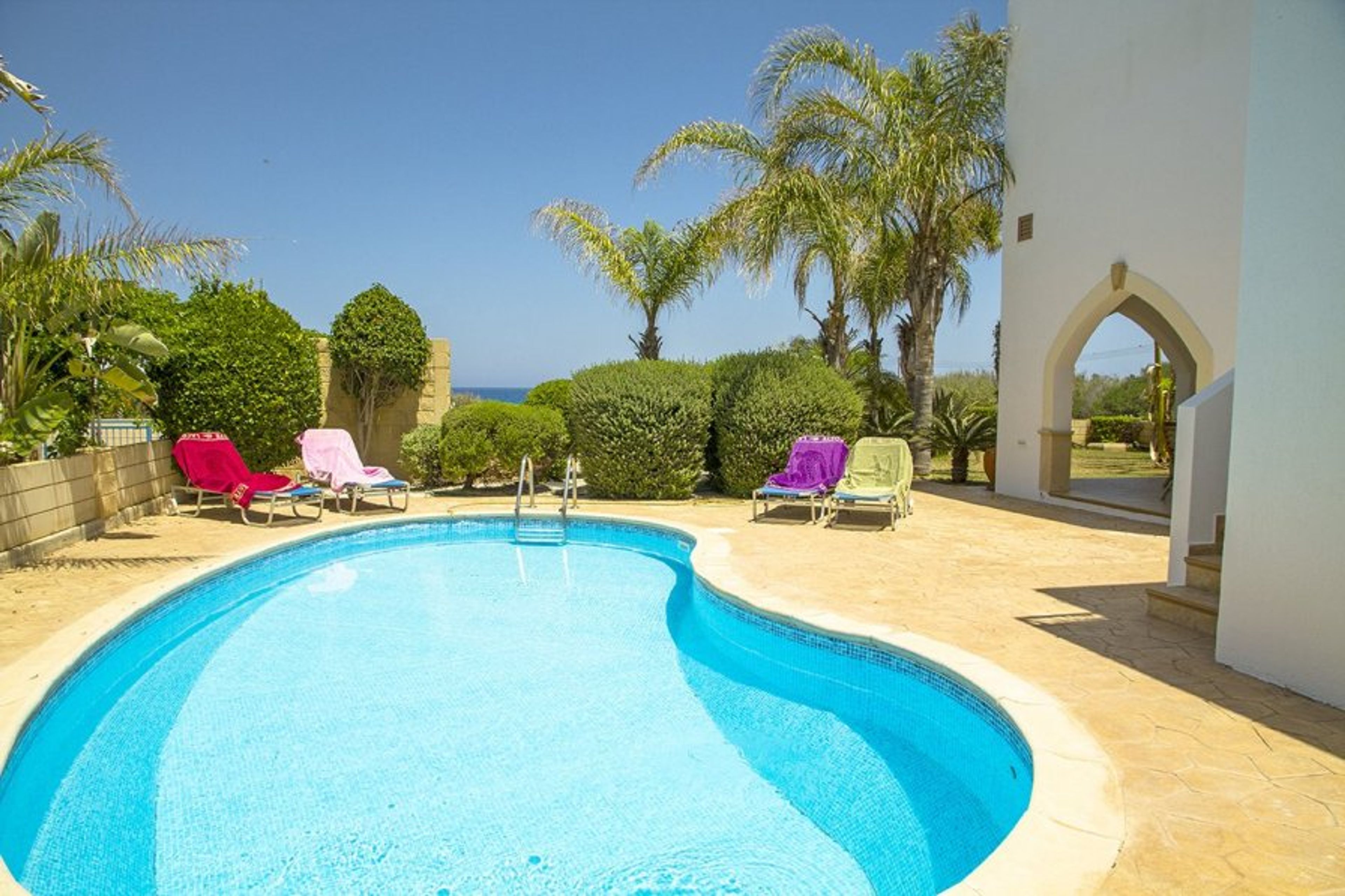 Pool area with sea view