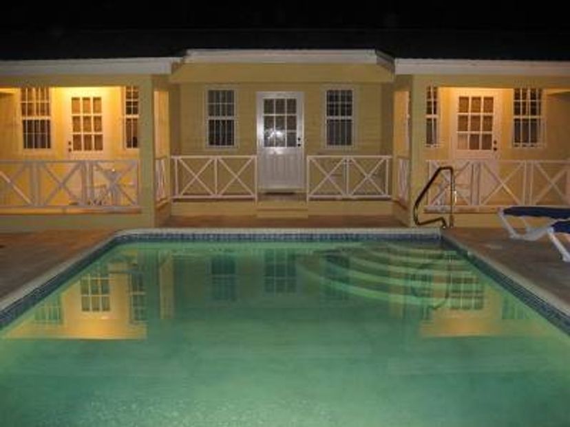 Apartment in Maxwell, Barbados: Pool by night