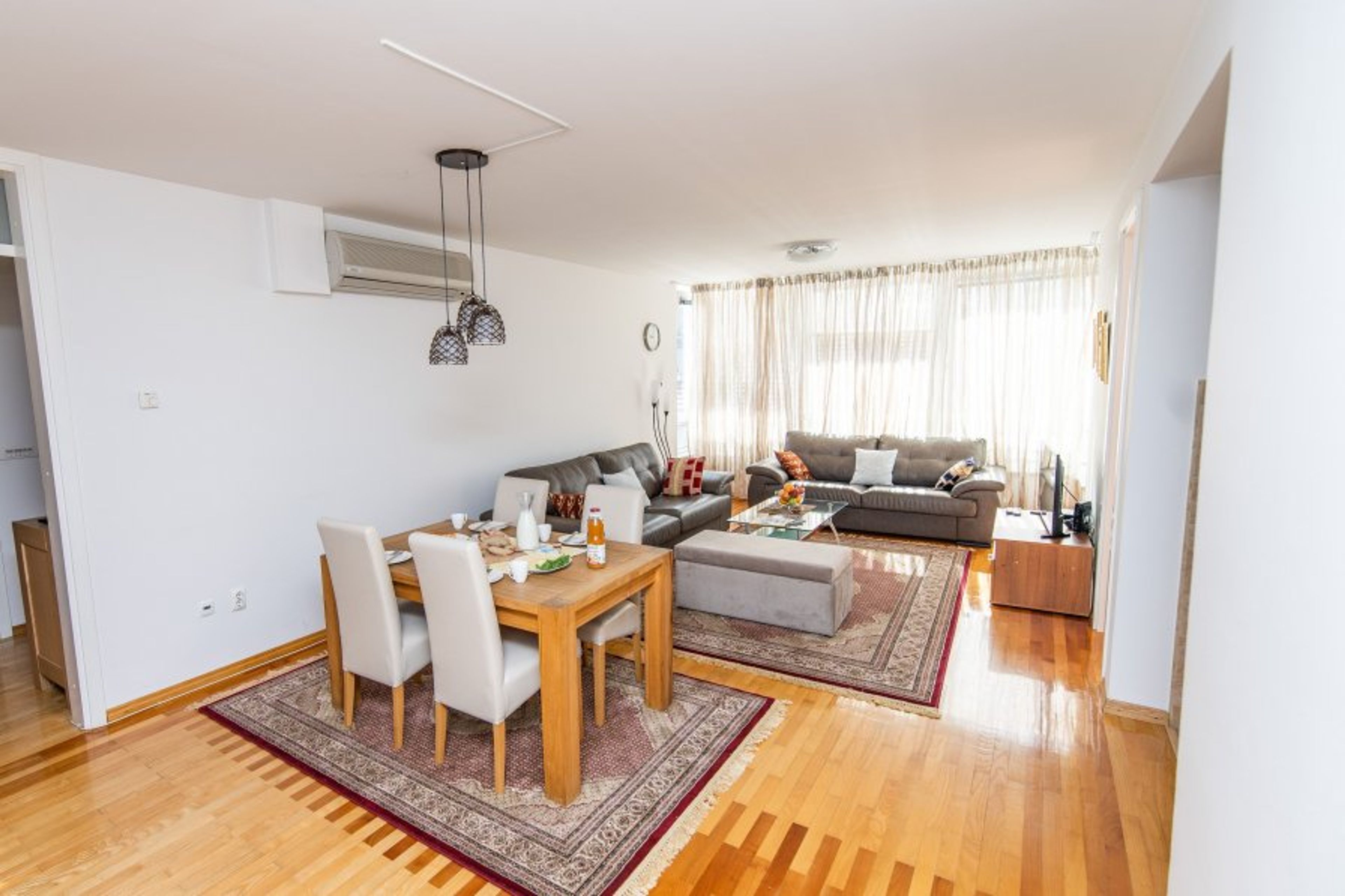 The modern and spacious living and dining area