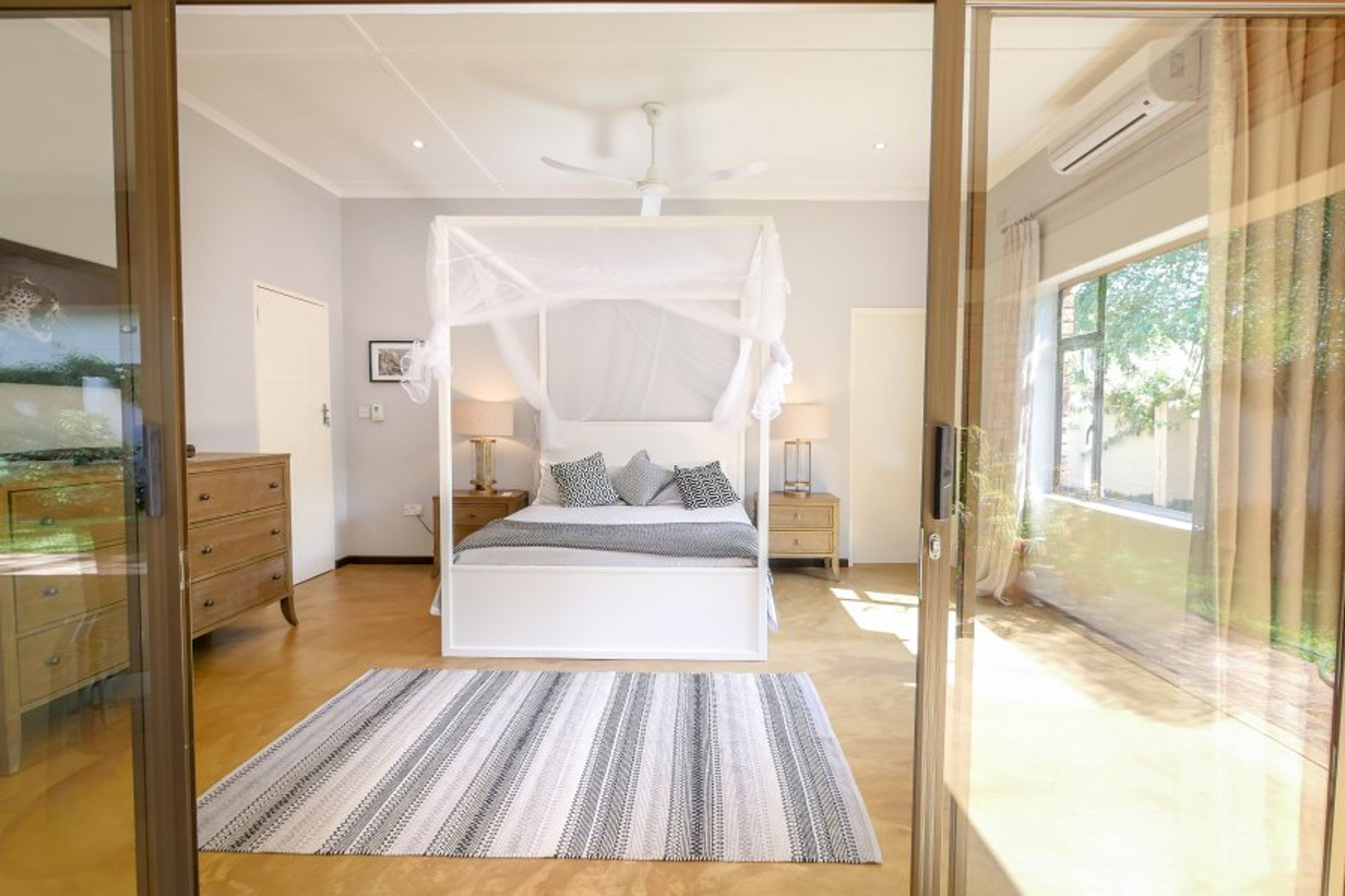 King size bedroom with ensuite and air-conditioning