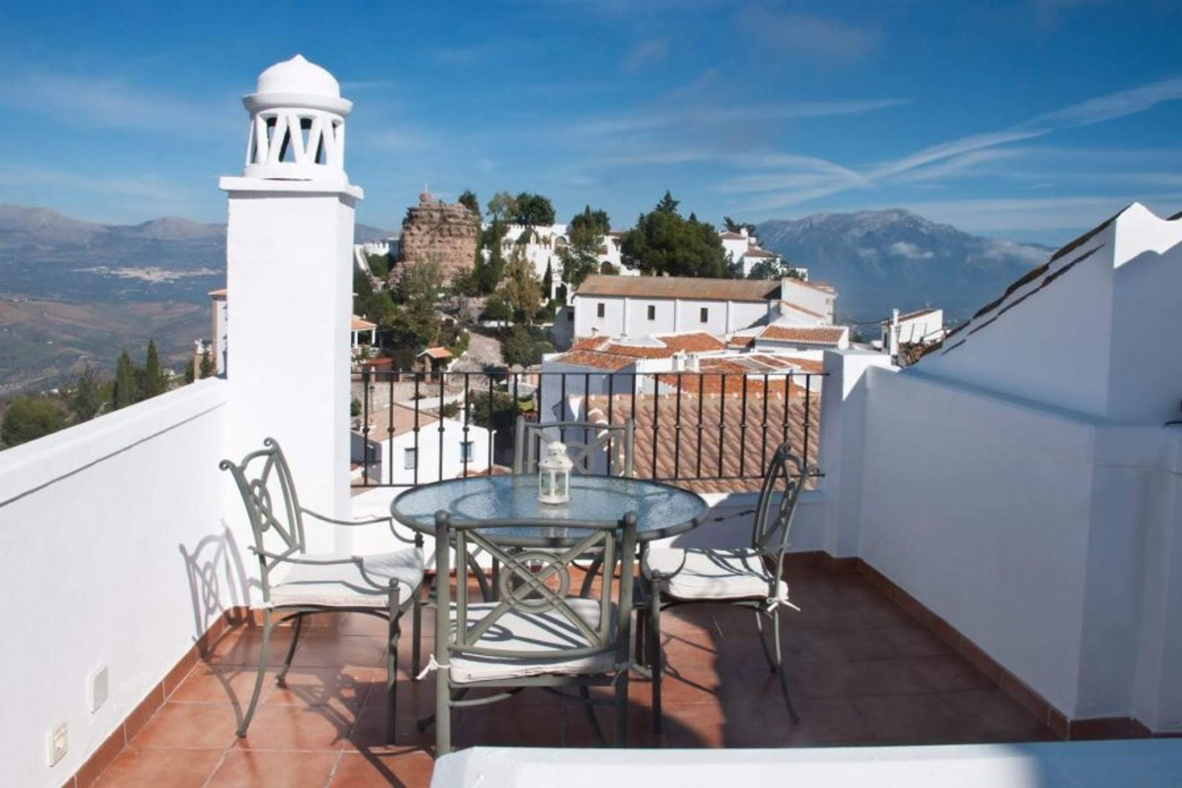 Our terrace has a breathtaking view at the Sierra Tejeda and the Med.