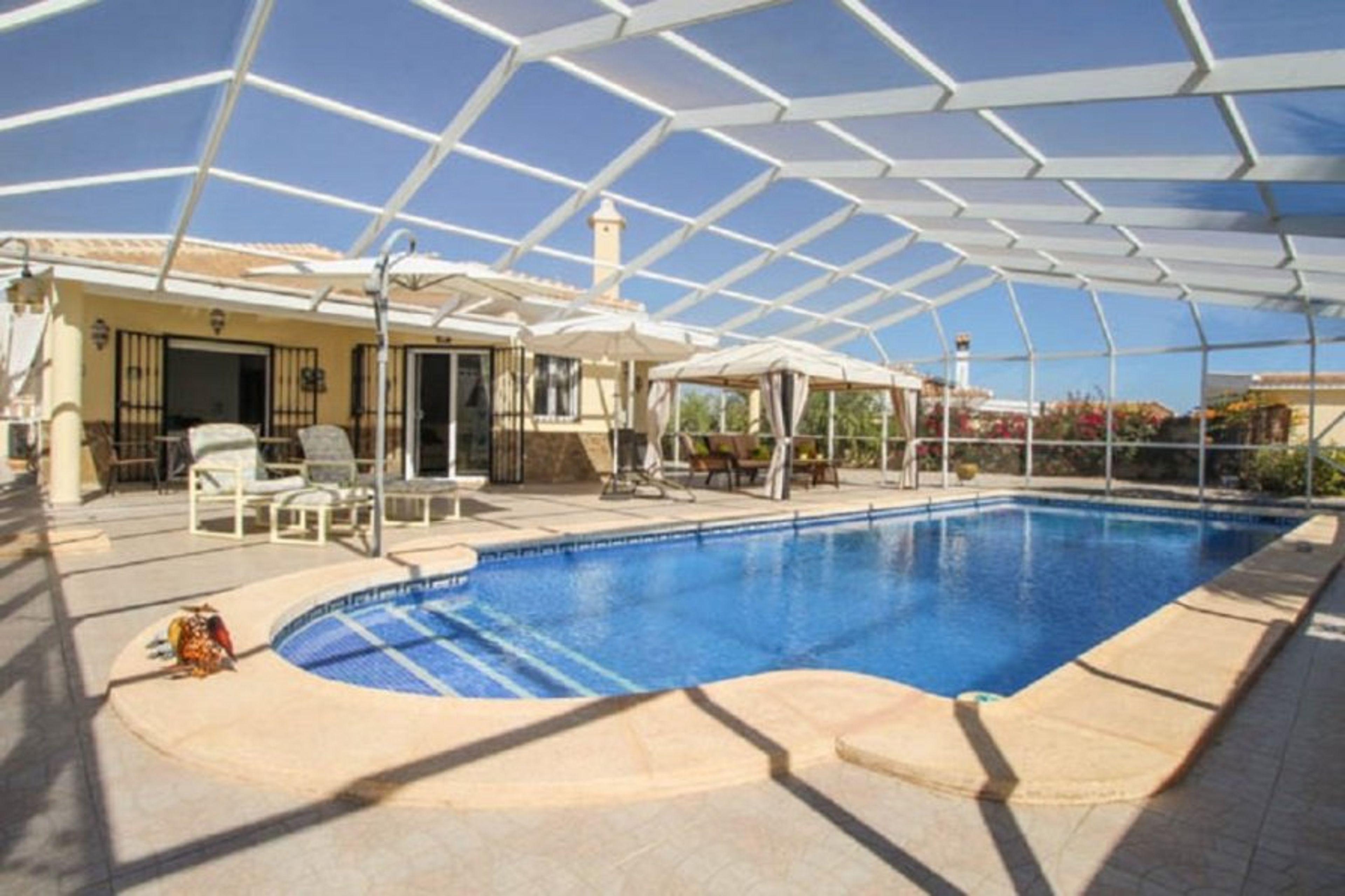 10 x 4 meter pool with plenty of tables, chairs and lounges. 