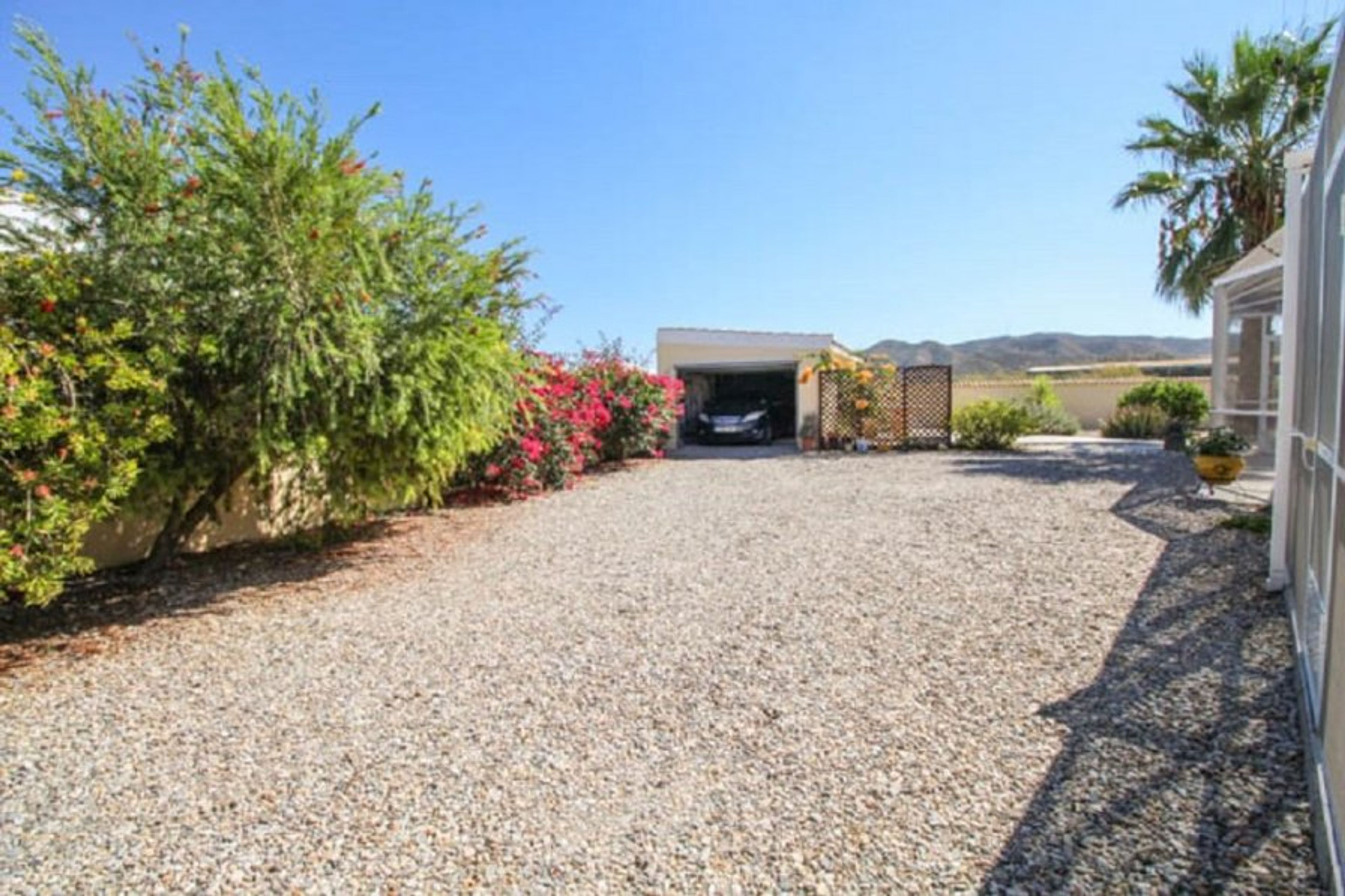 Plenty of off street parking. Nice flowers.