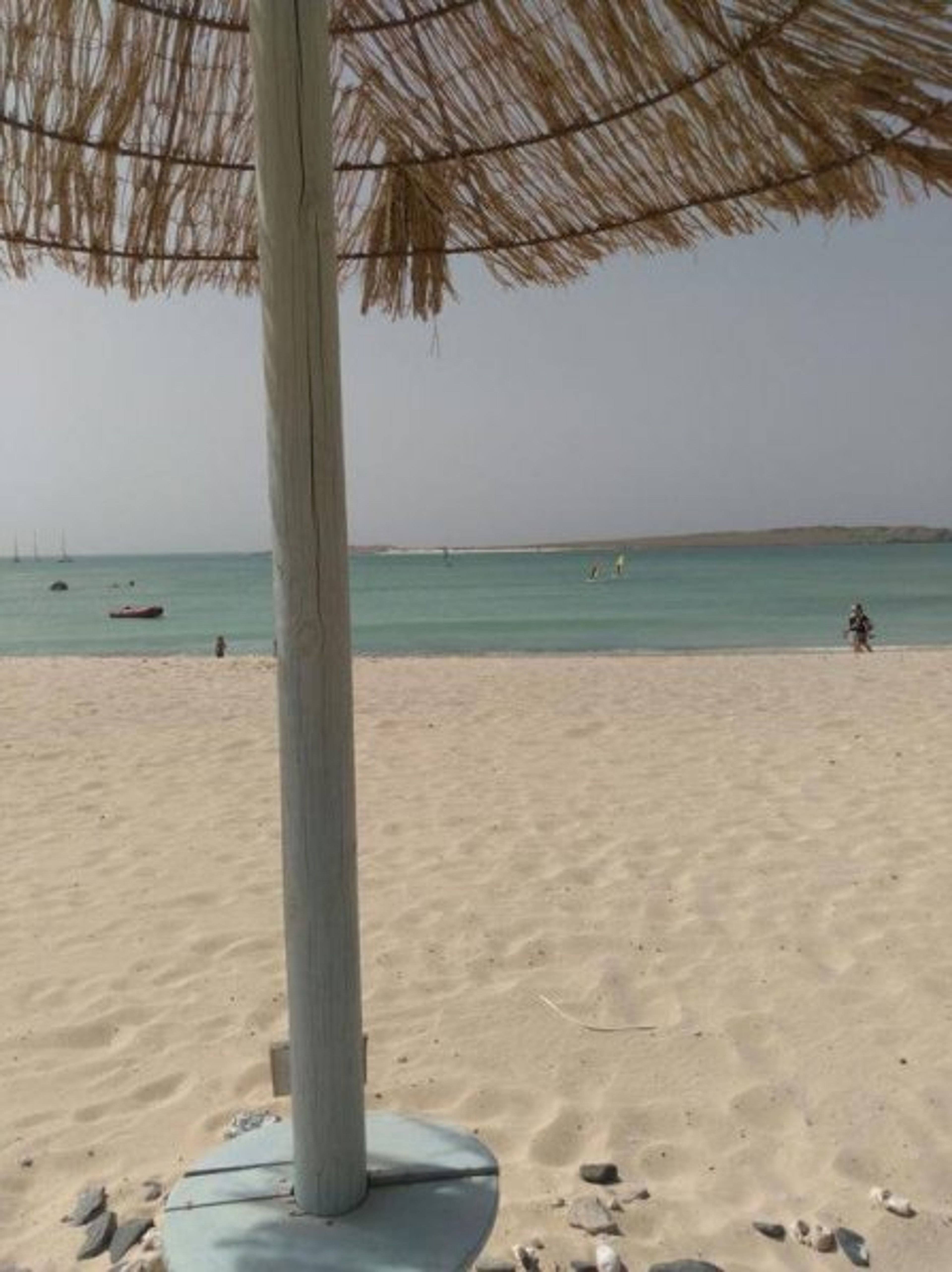 Praia Estoril in front of apartment, private area with bar