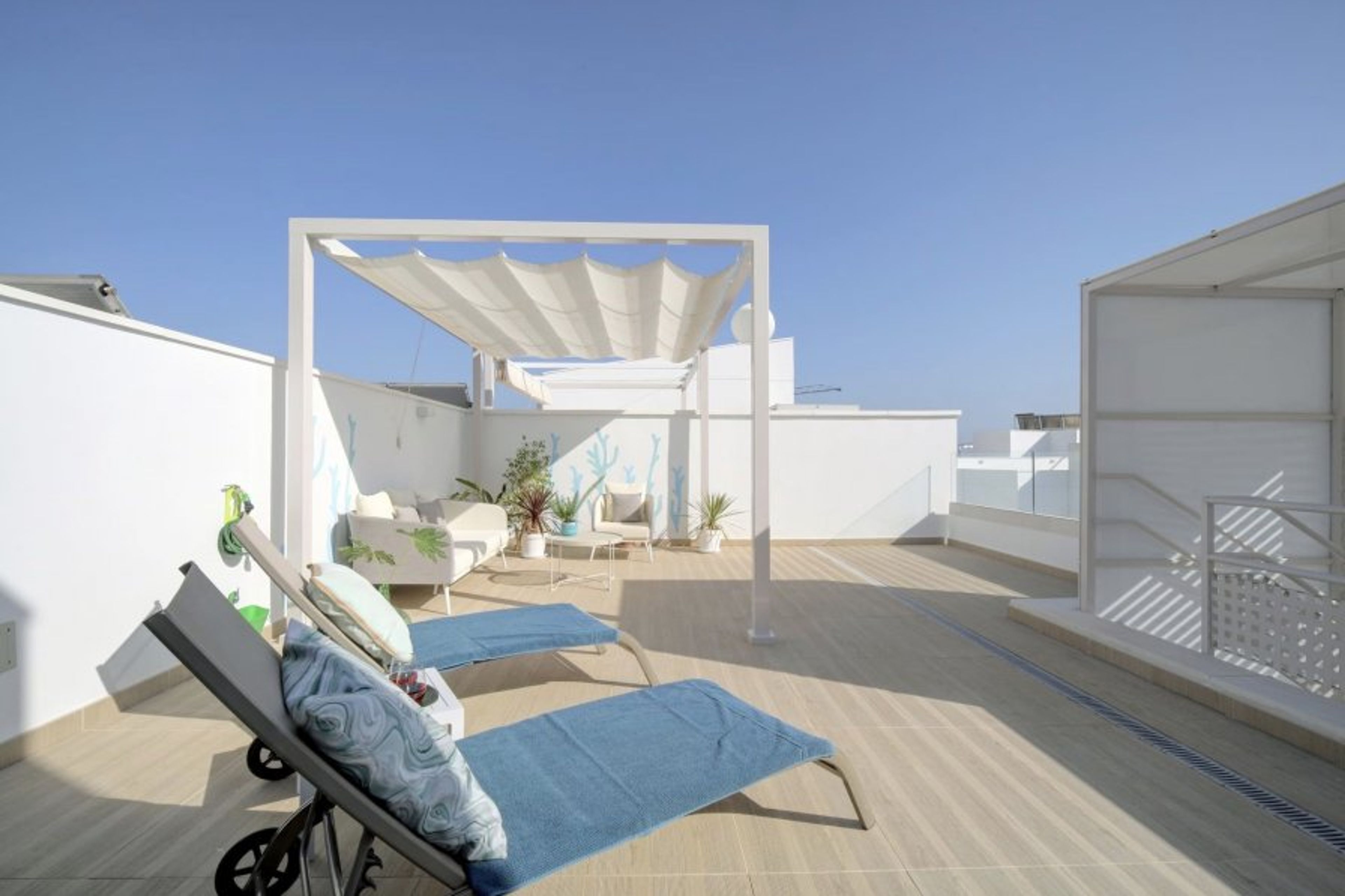 Private Roof terrace with furniture to relax and sun bathe 