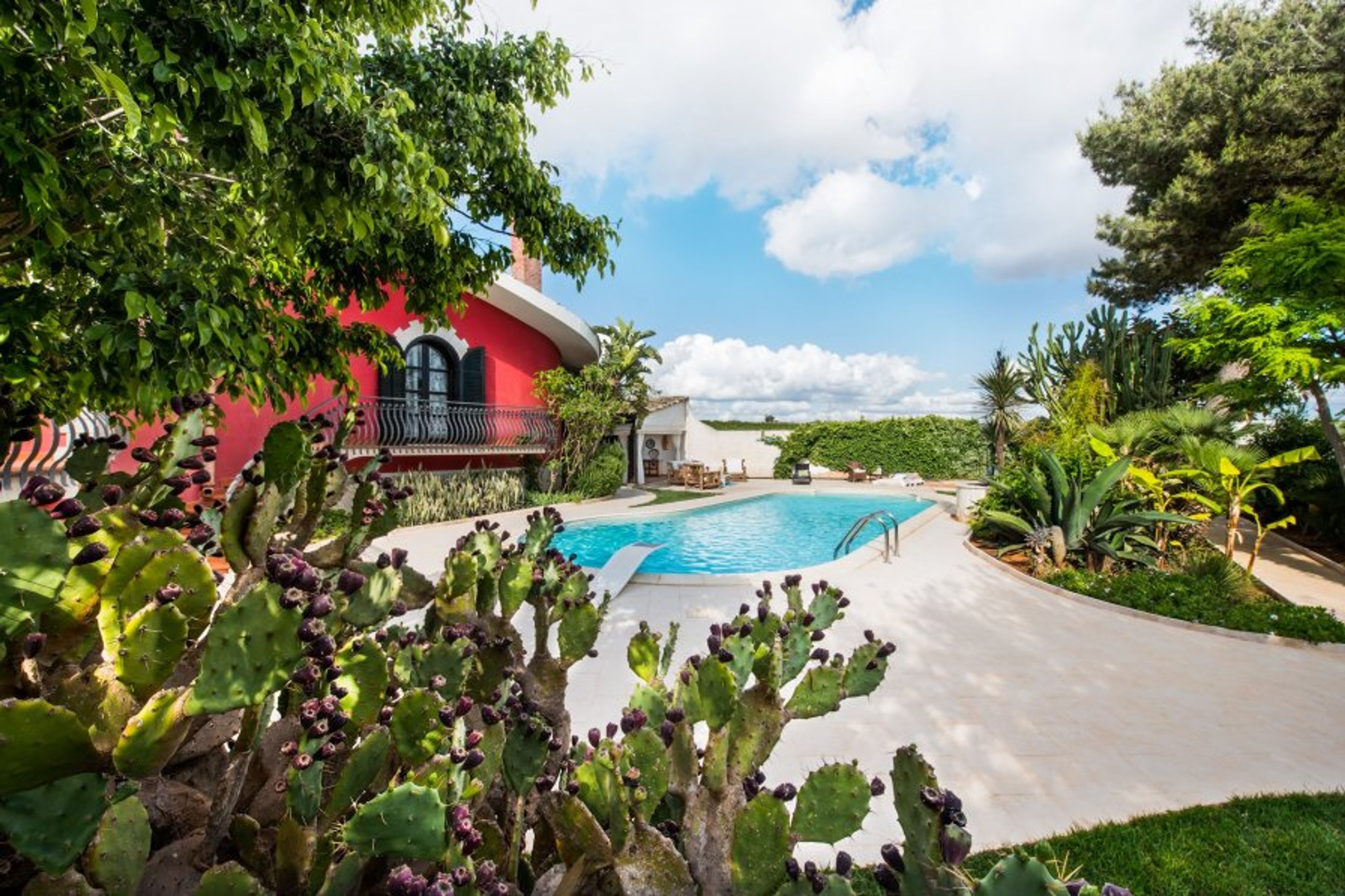 Outdoor. Busatta swimming pool, white stone of Piacenza, plank gress