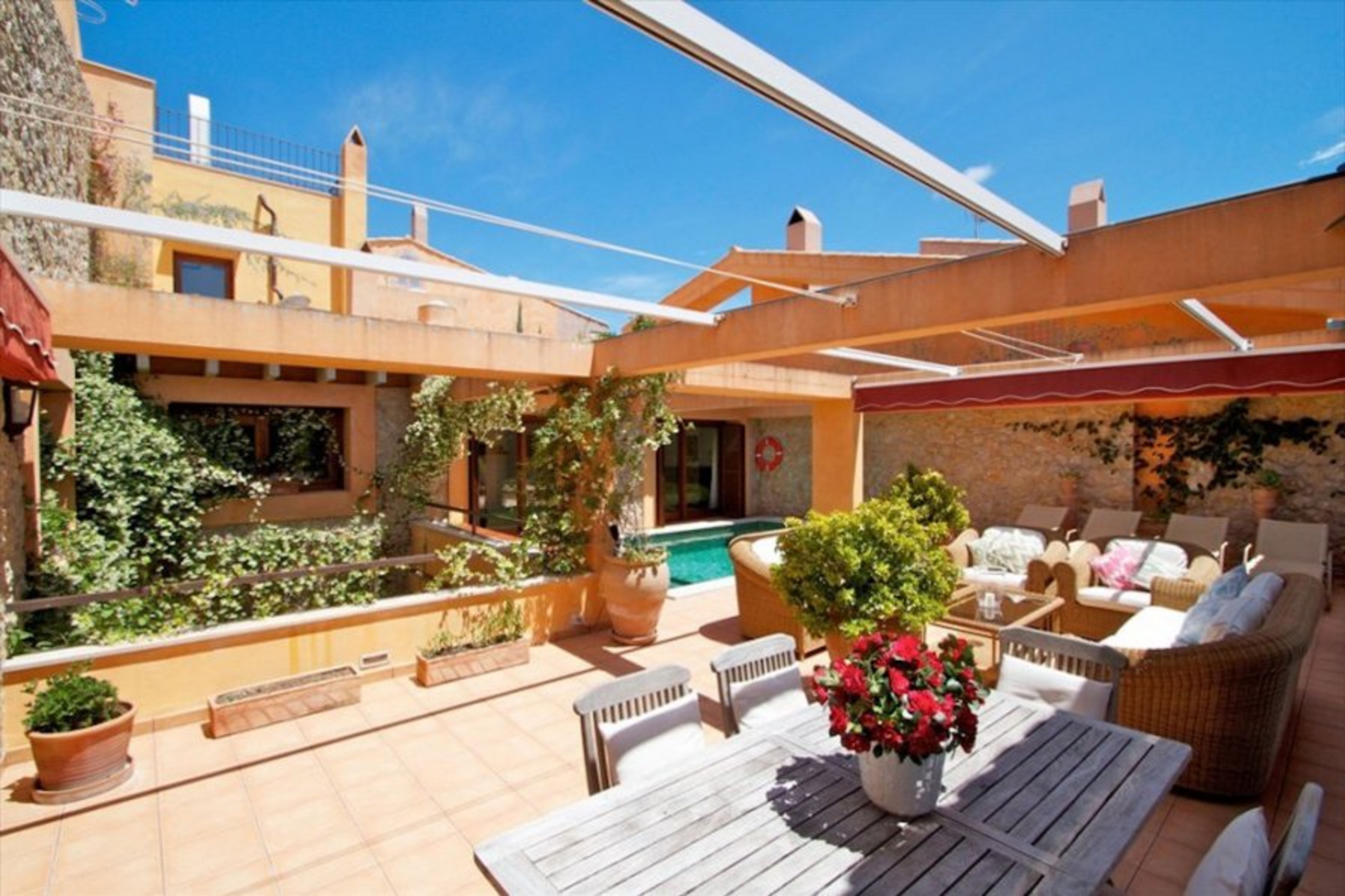 Terrace with seated area and pool