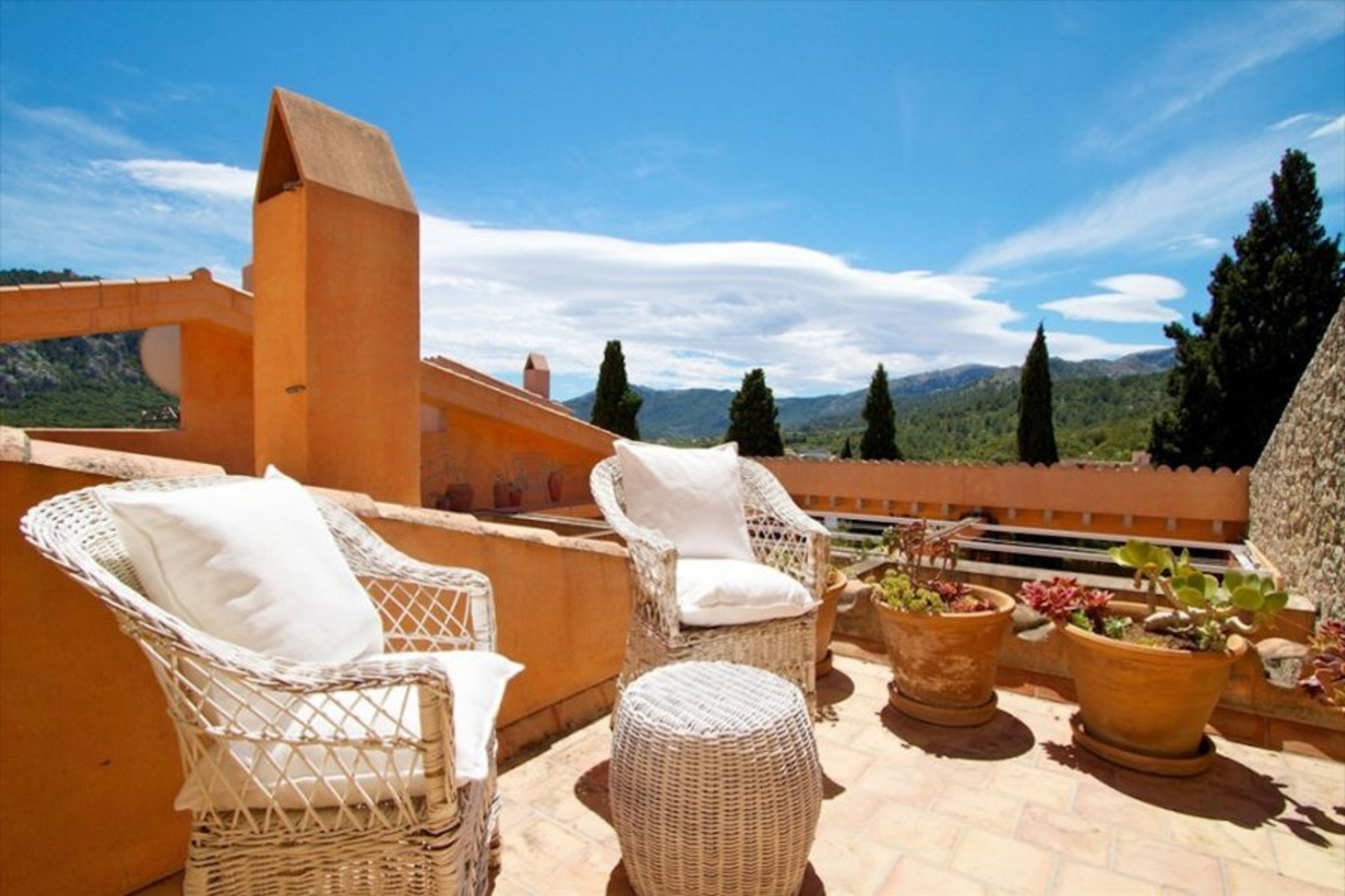 Terrace with seated area and pool