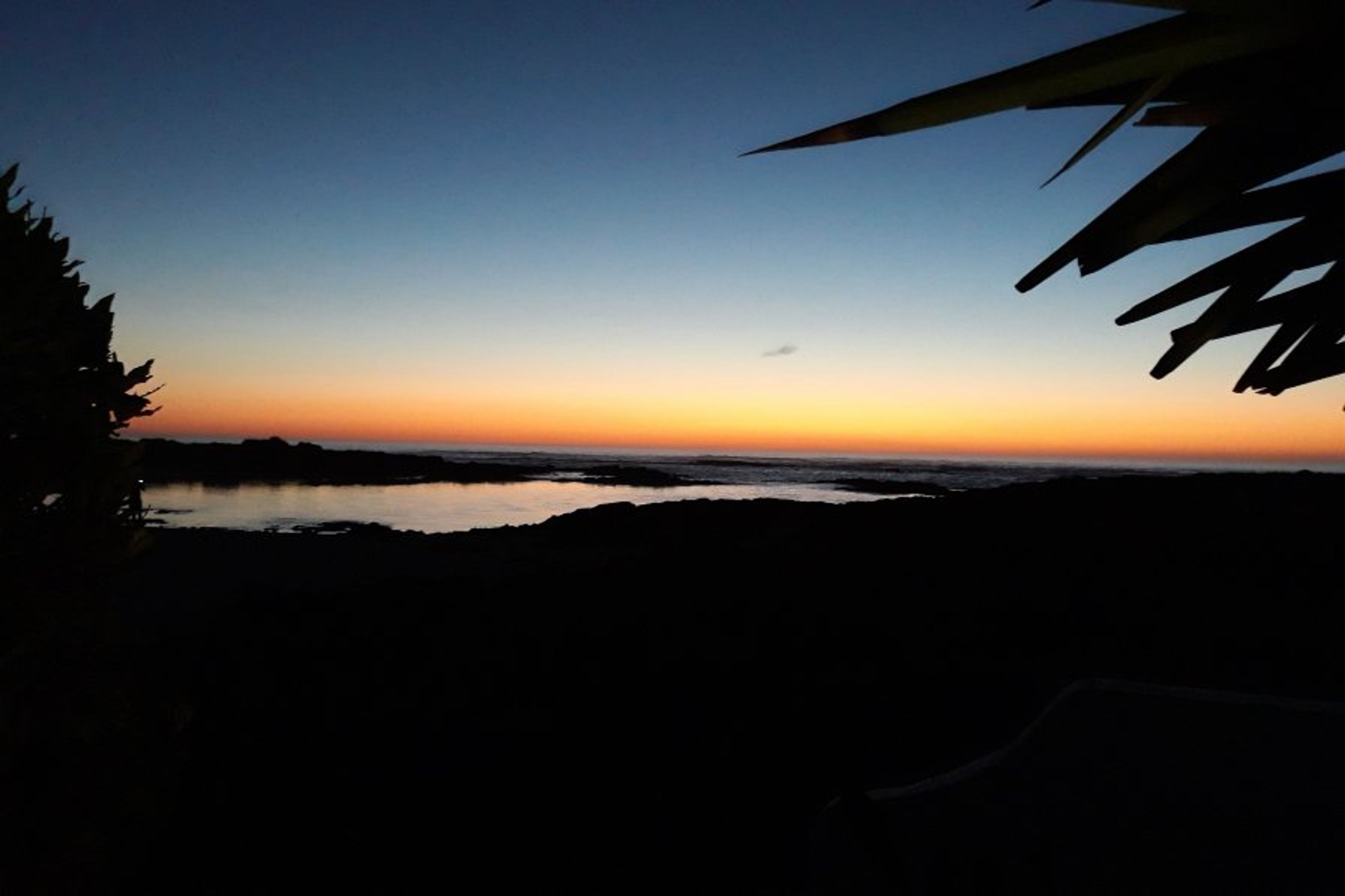 The last rays of sunset from the terrace of Casa Playa