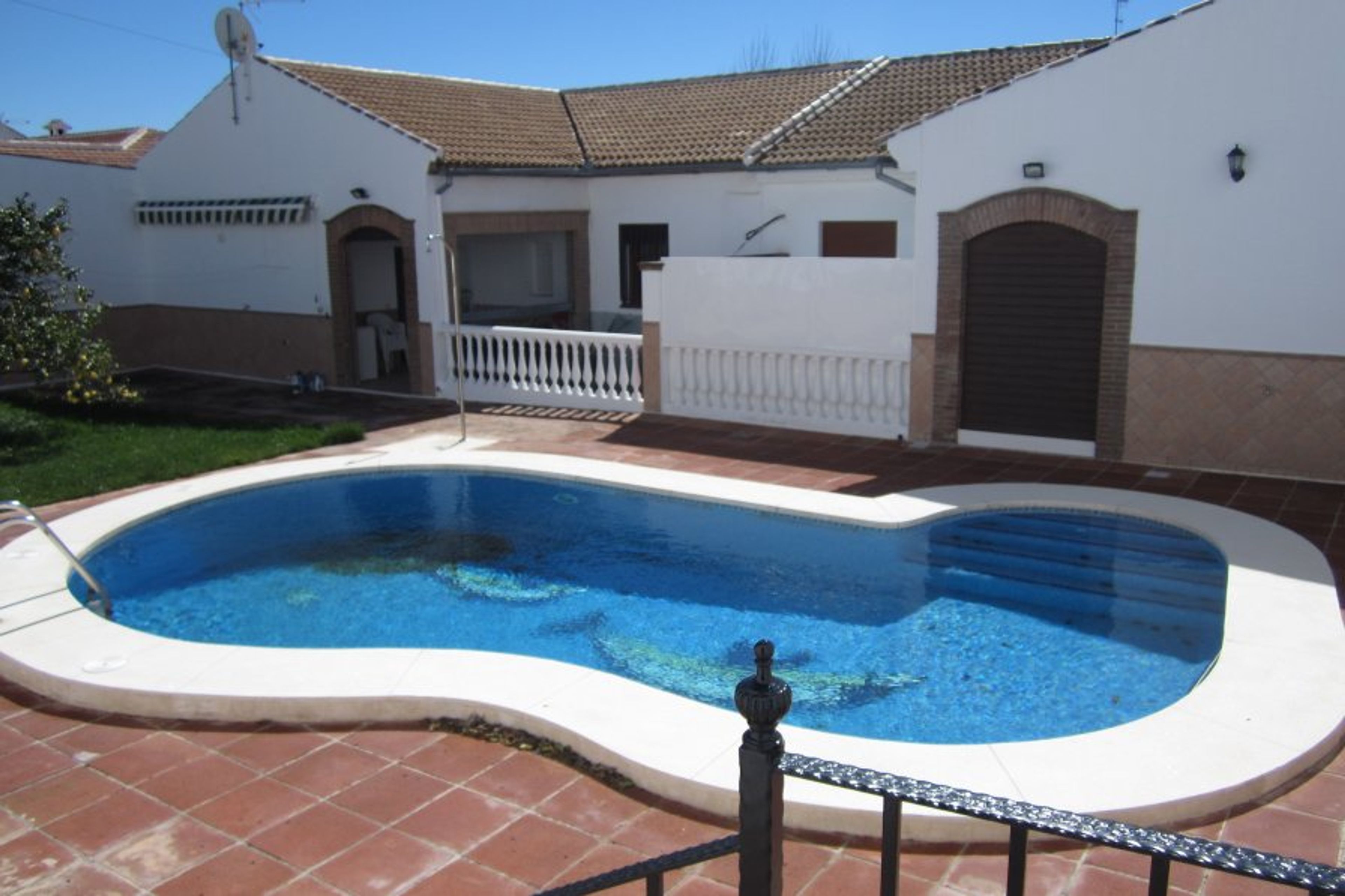 A view of the pool and garden at the back of Casa Ventarga