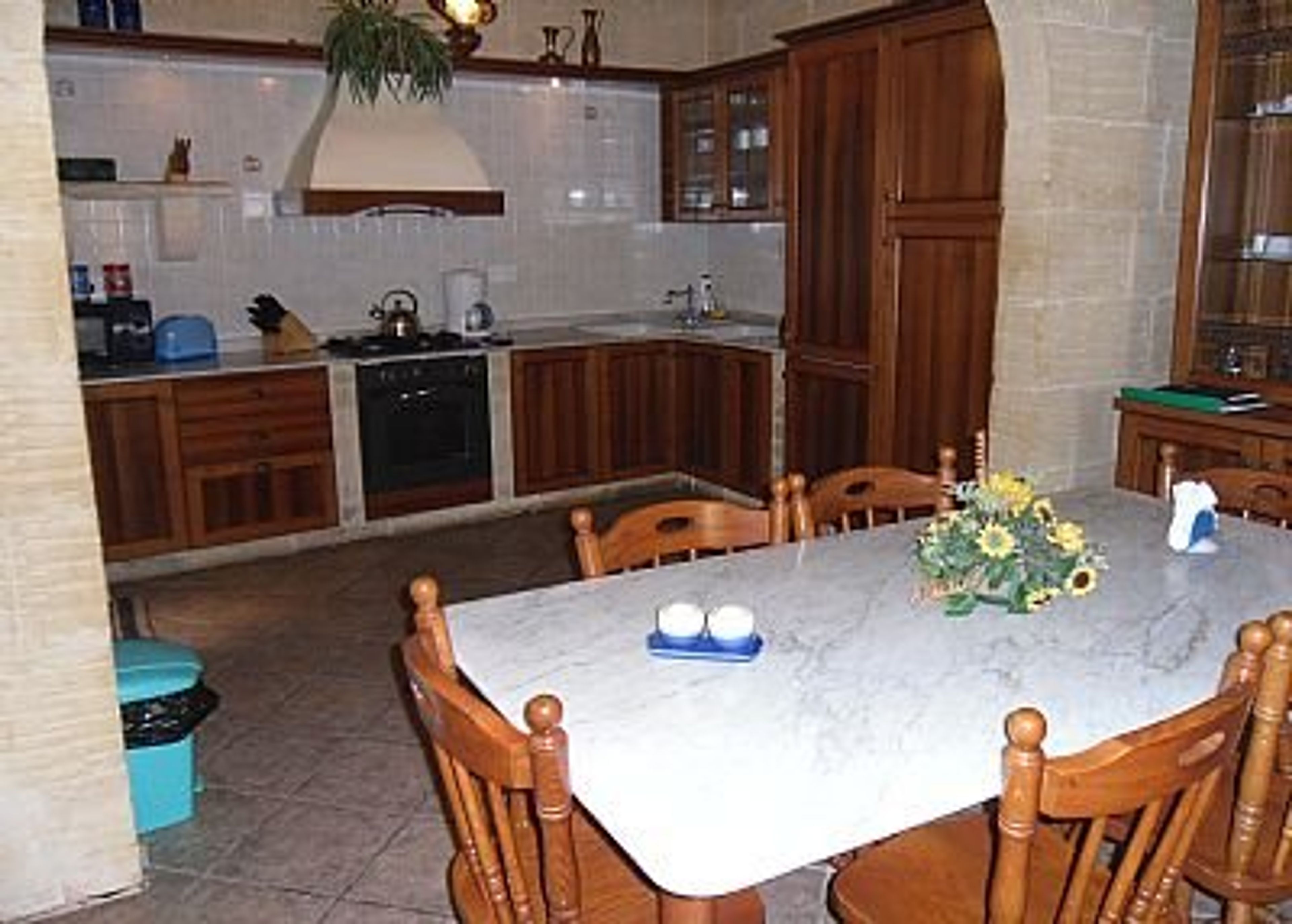 fully equipped kitchen next to dining area