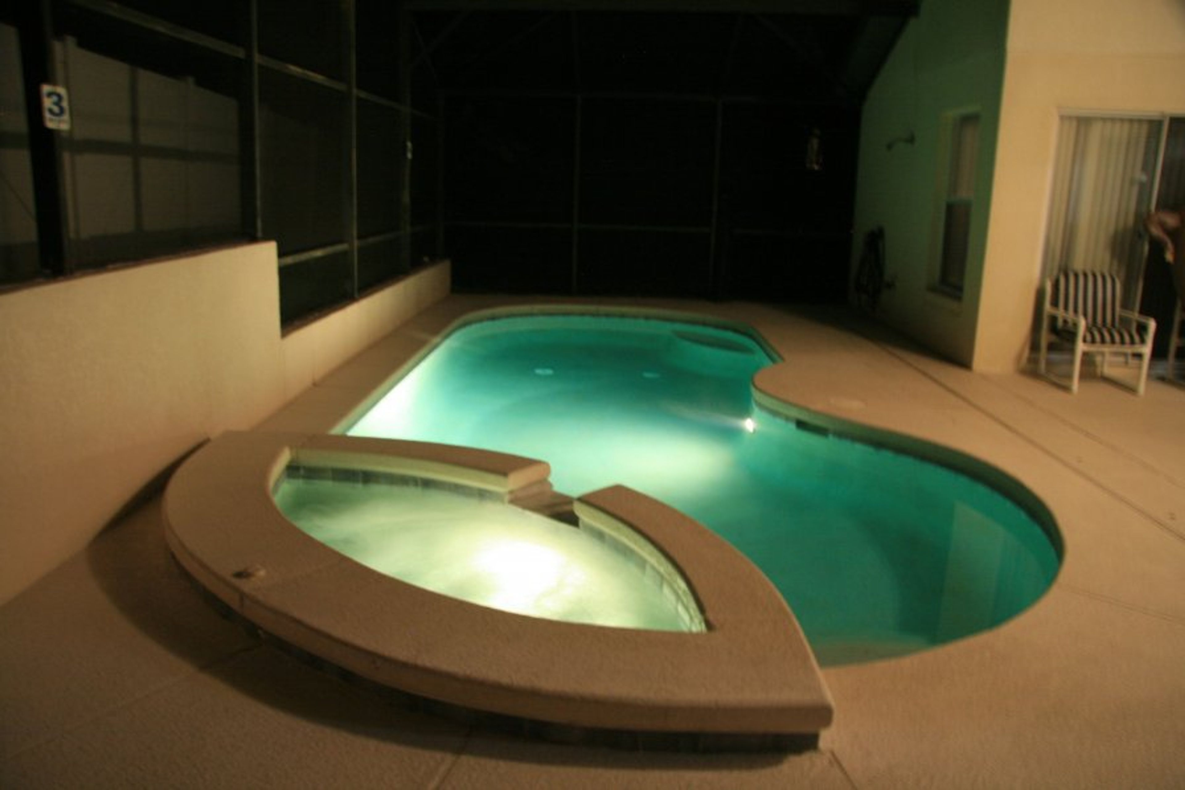 The pool and spa in the evening