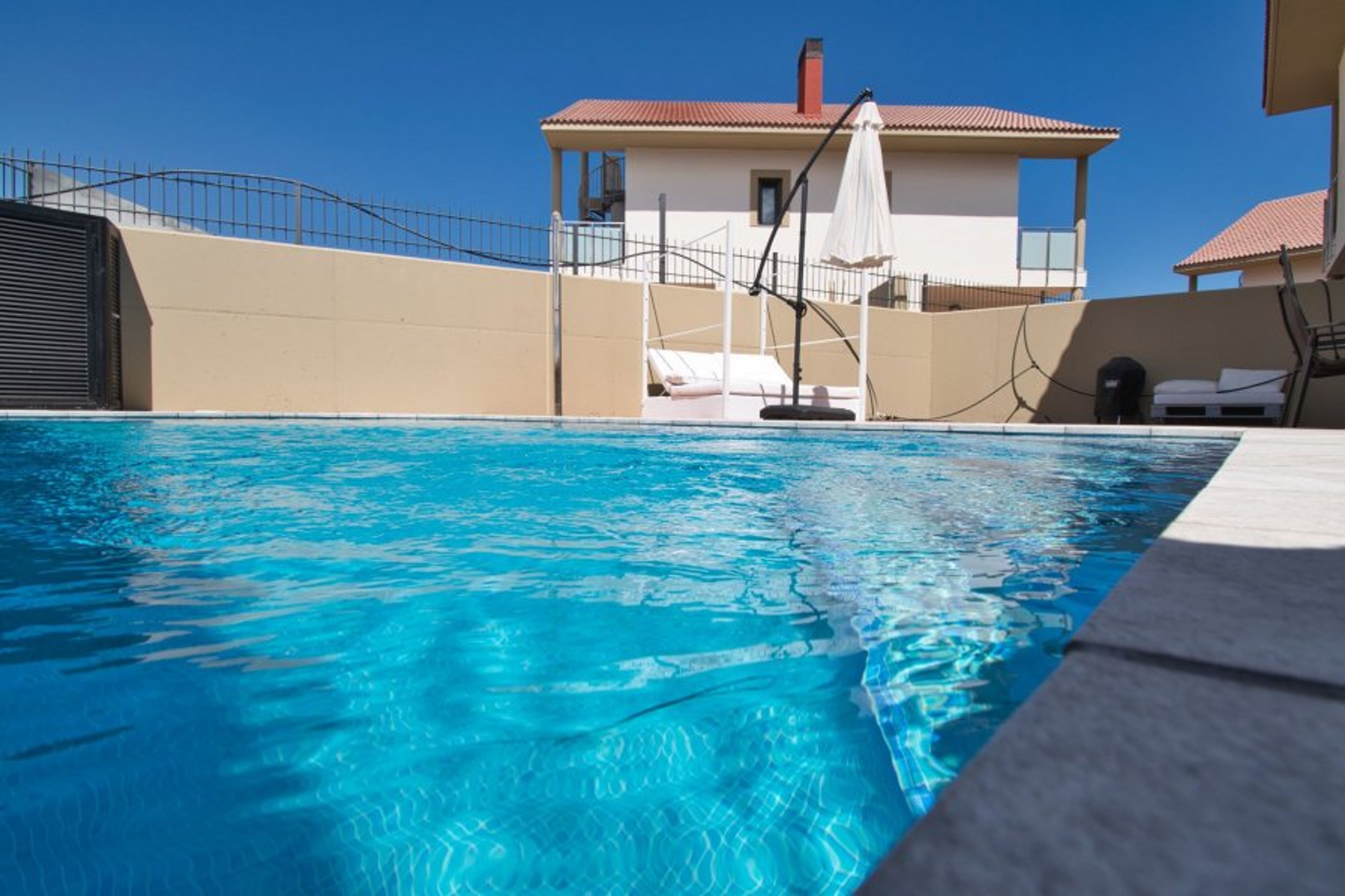 The stunning pool and villa