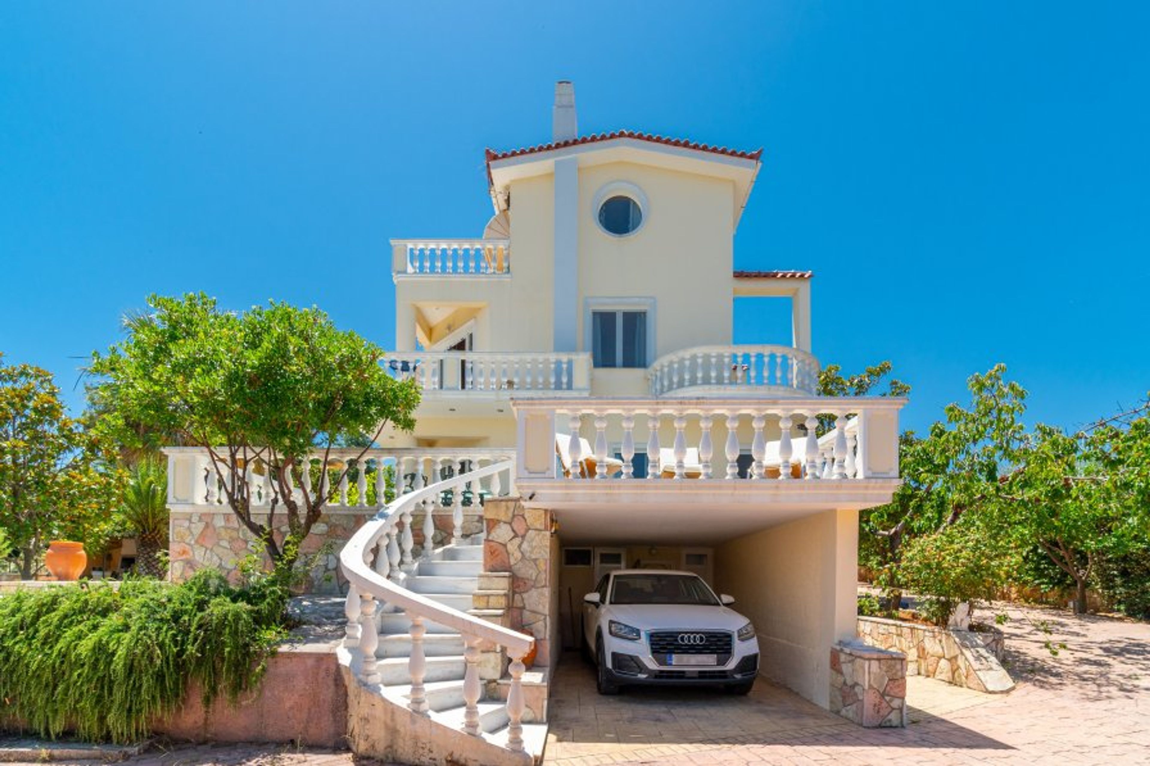 1.2 A different angle of the villa showing the private parking