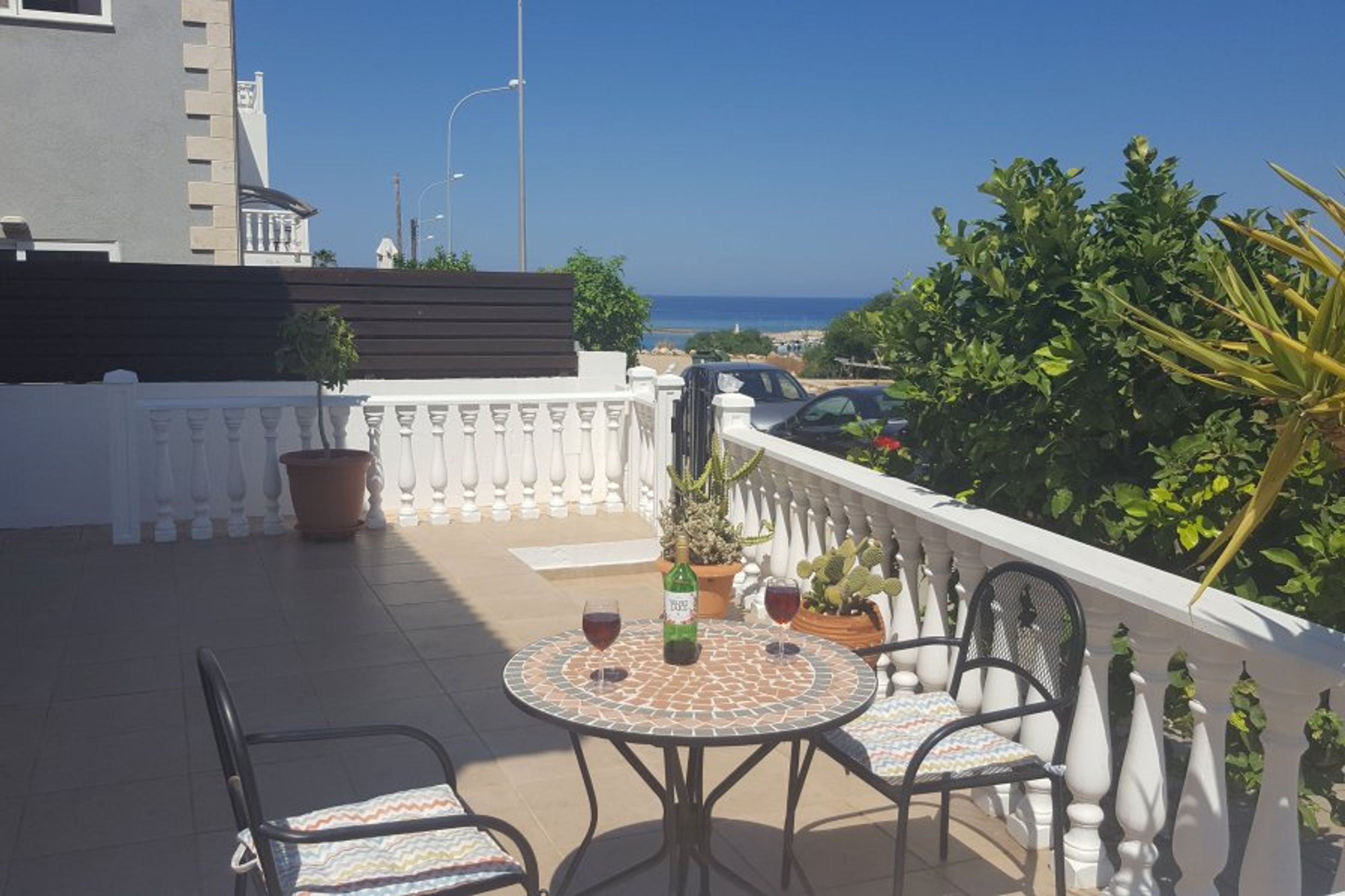 View towards Ayia Triada beach and harbour from the front terrace. 