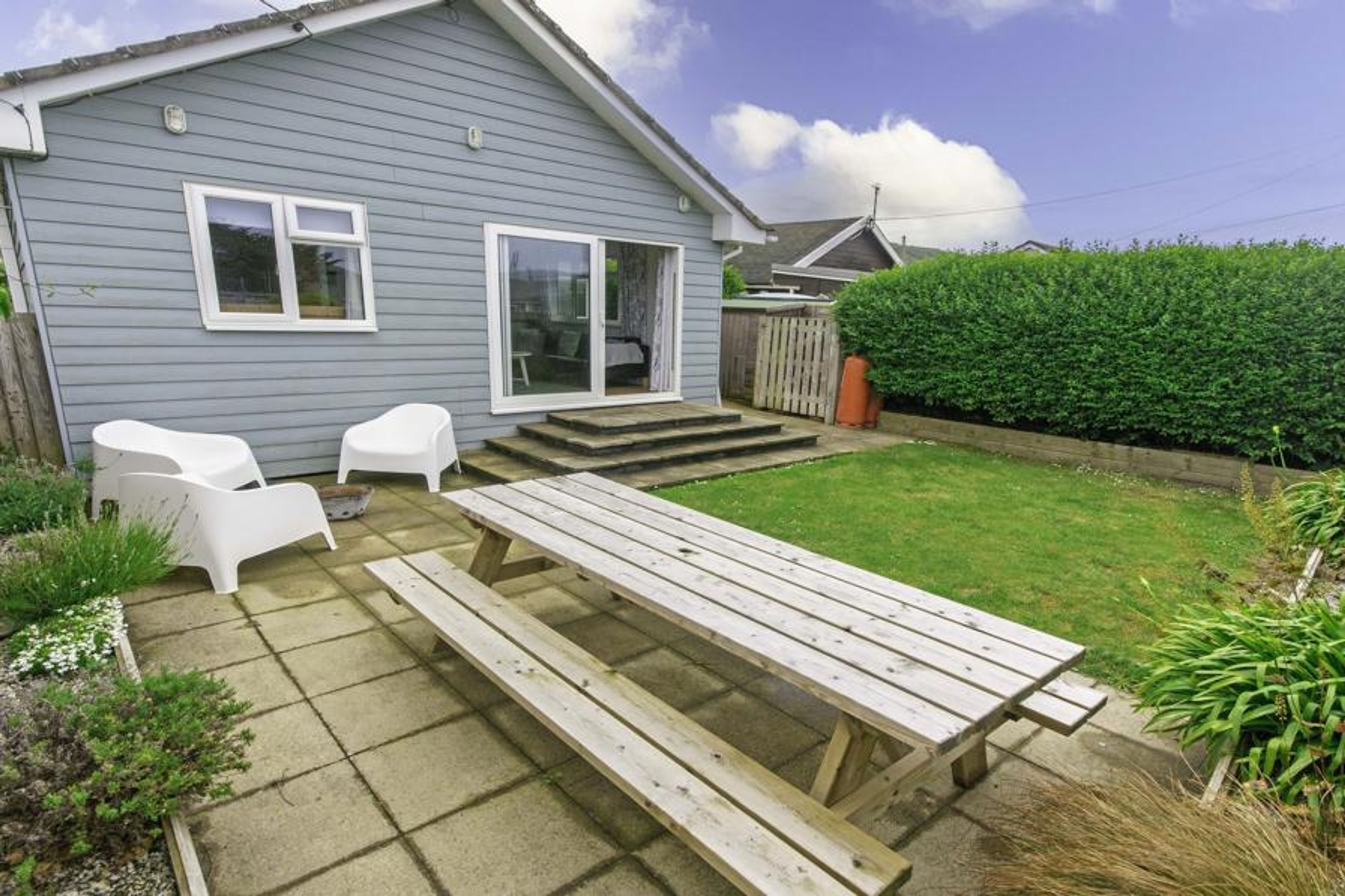 Rear Garden with patio furniture