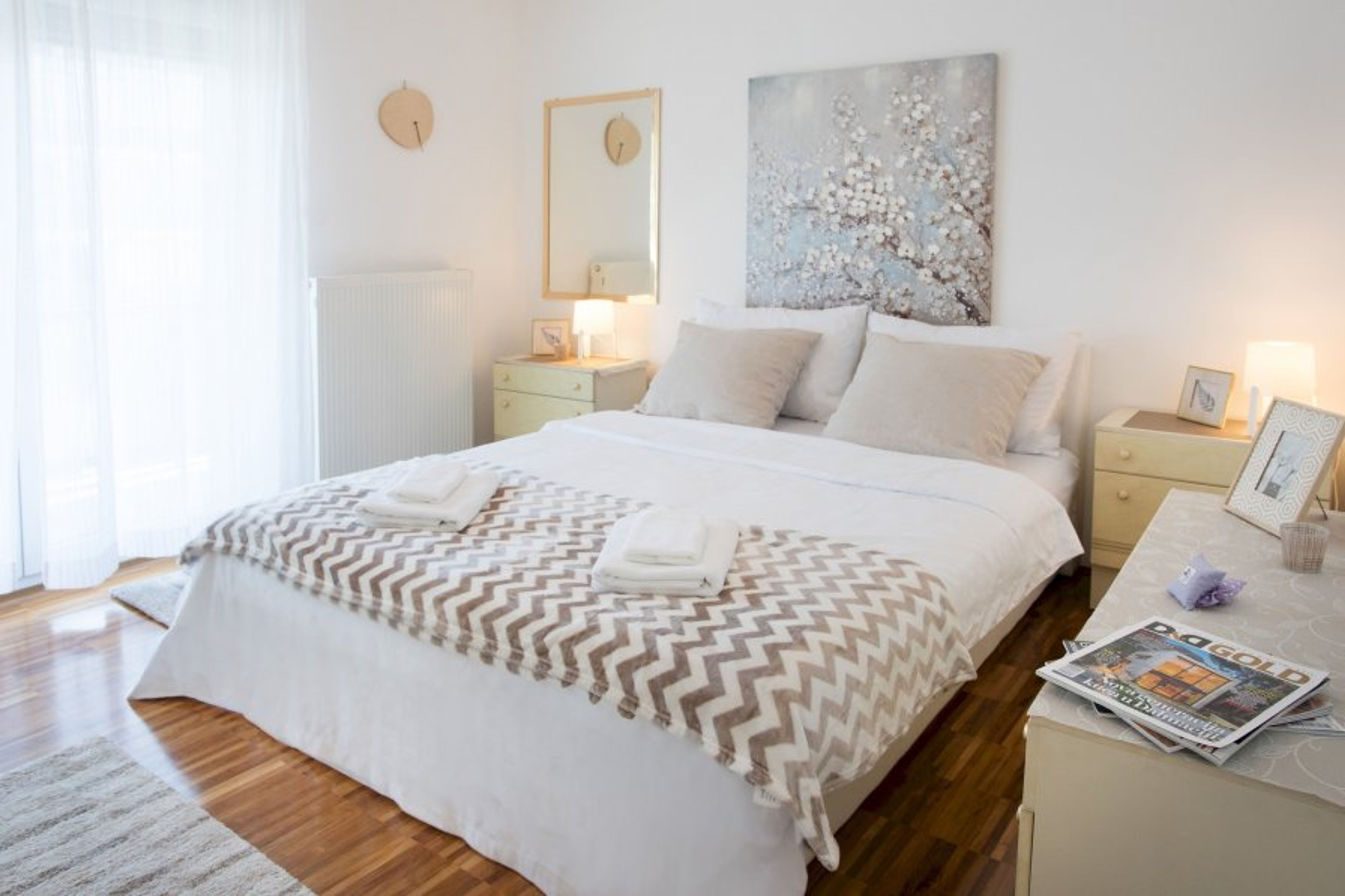 Bedroom with cozy king size bed and fresh towels provided