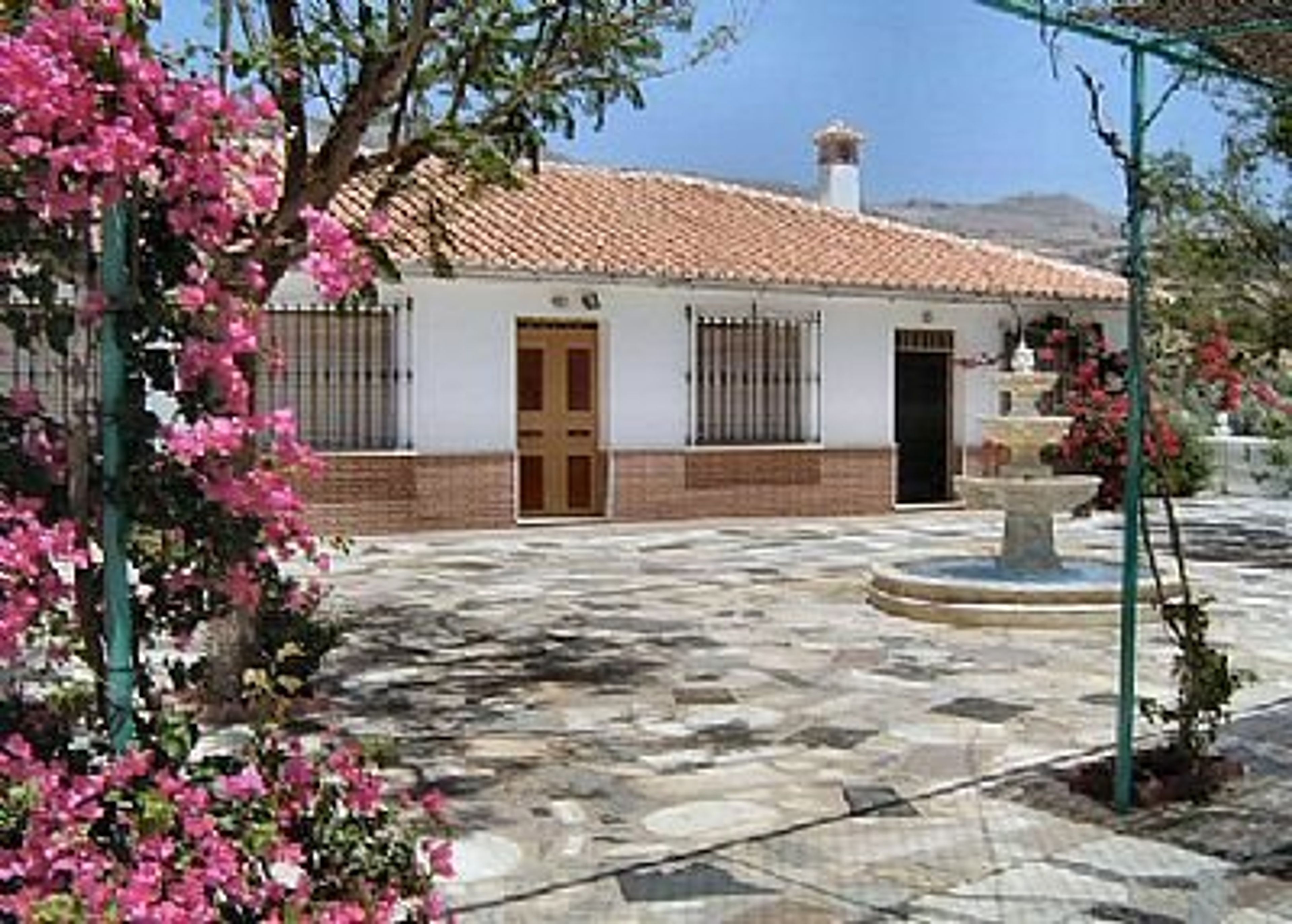 Looking across the marble terrace towards the front of the house