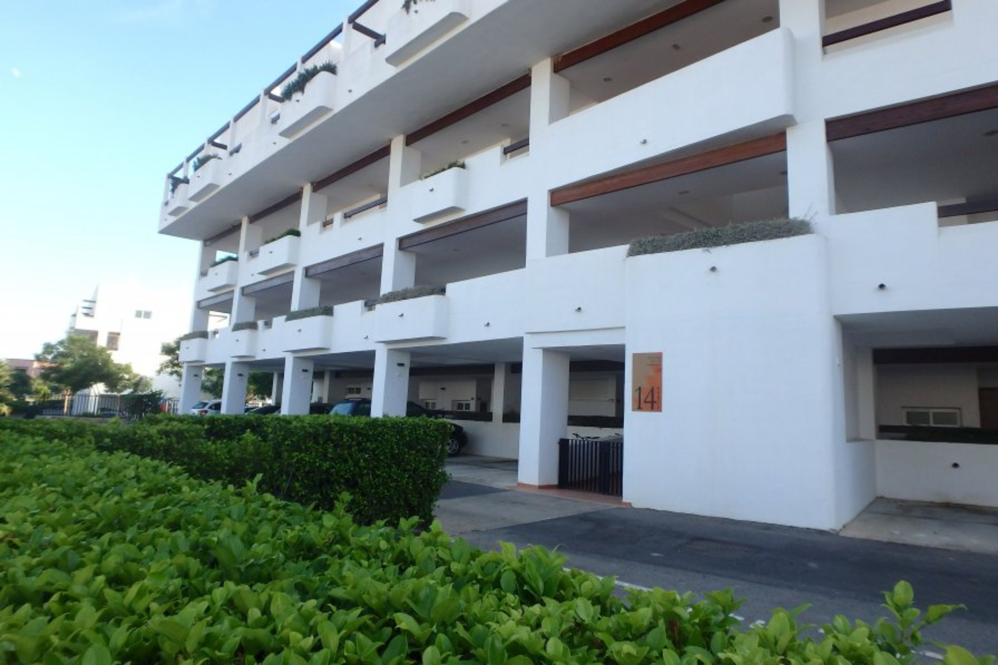 Front of Penthouse Block 14 with parking area.
