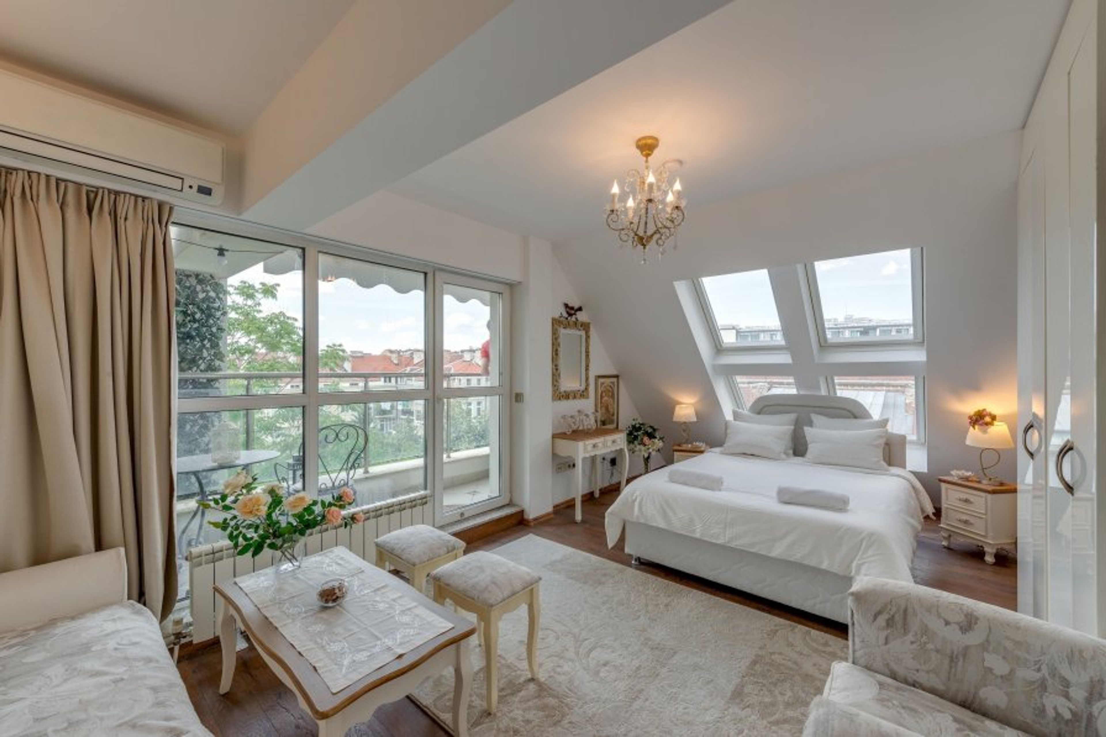 King Size Bed - with beautiful windows above that are closable at night!
