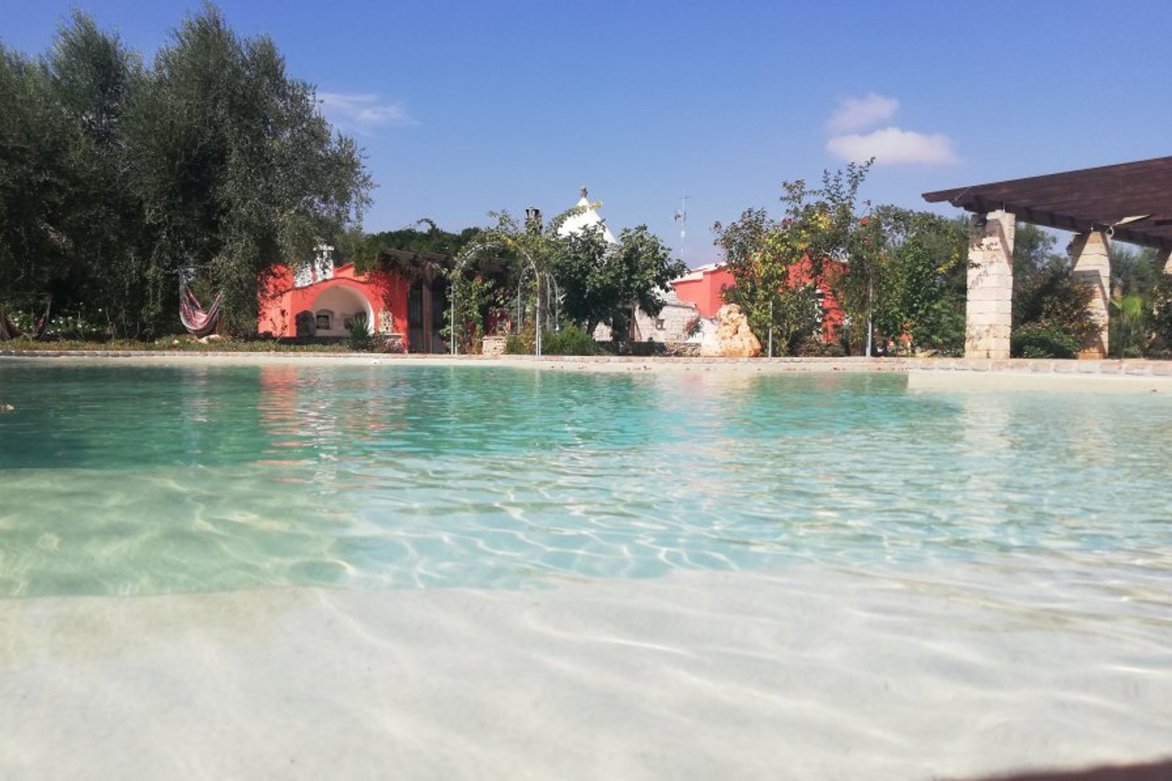 view from the pool to the trullo