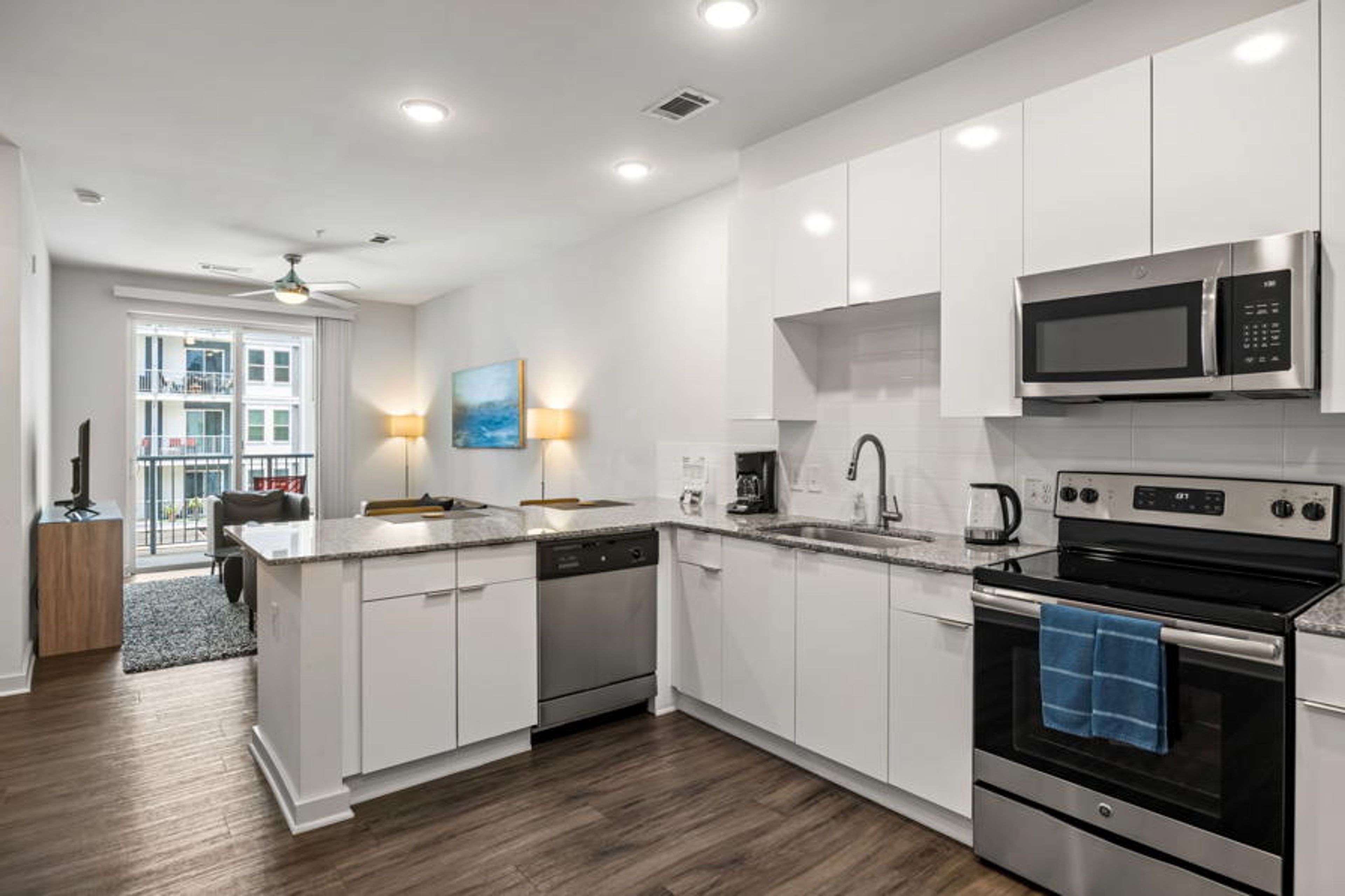 Modern Kitchen with Whirlpool Stainless Steel Appliances - Corporate Housing Atlanta - 1-Bedroom Spectacular Suites