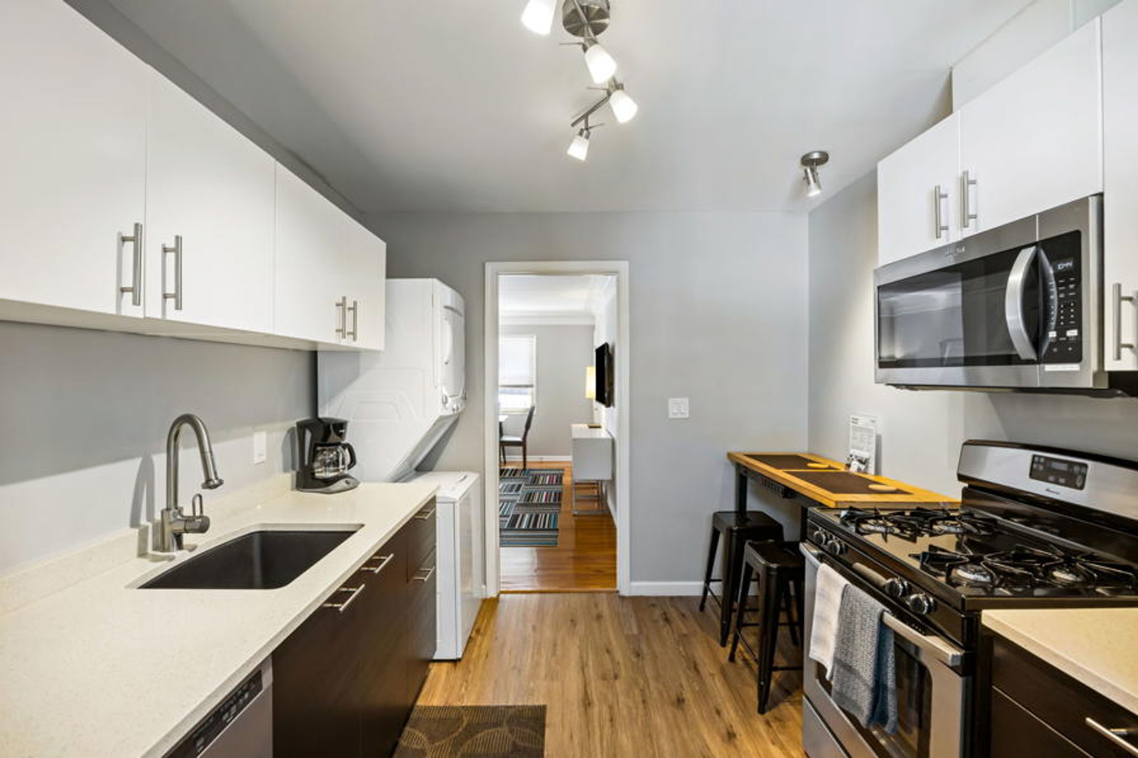 Brookwood Courtyard Condos - Complete Galley Kitchen with Full-Size Appliances