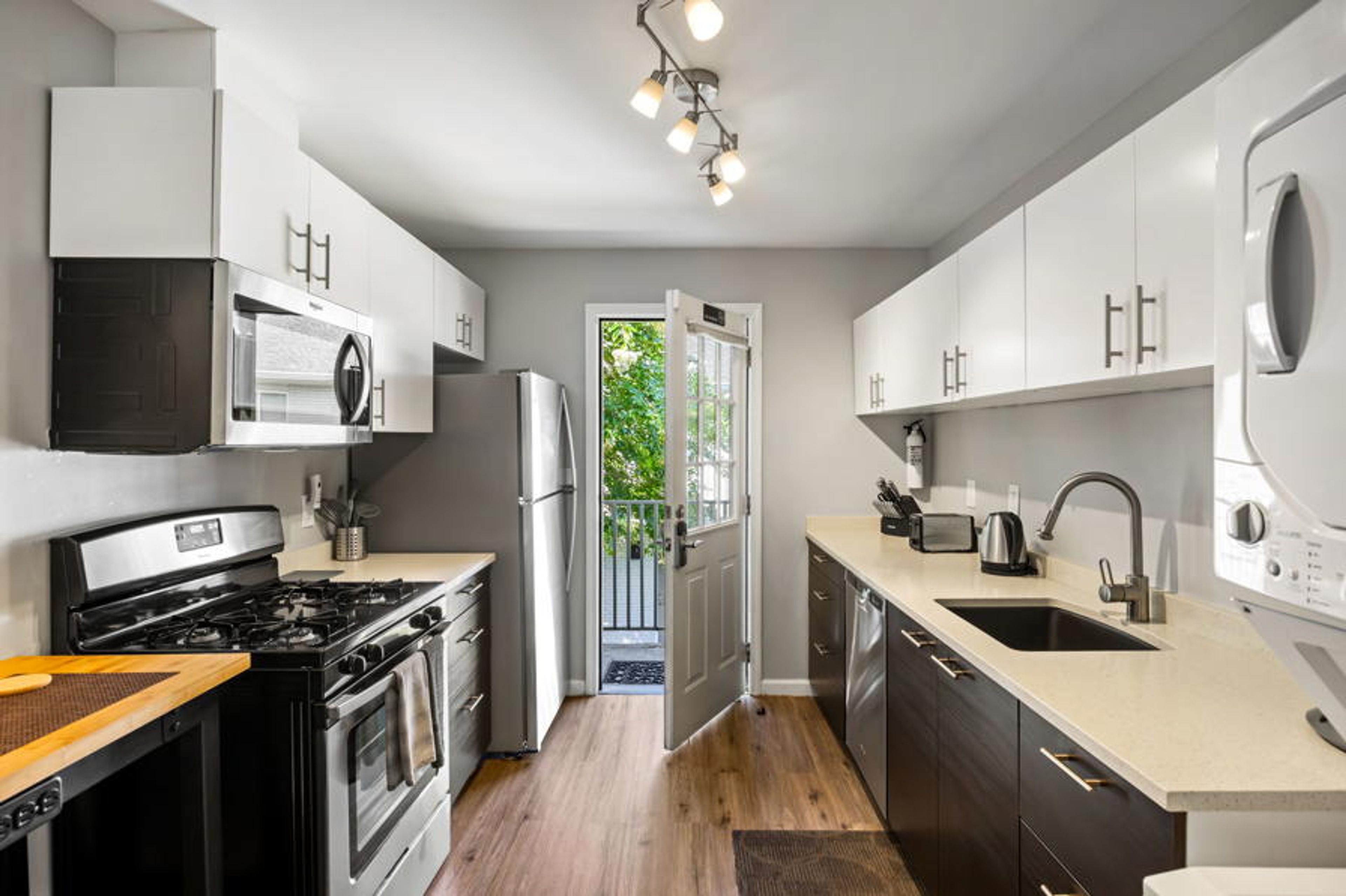 Brookwood Courtyard Condos - Complete Galley Kitchen with Full-Size Appliances
